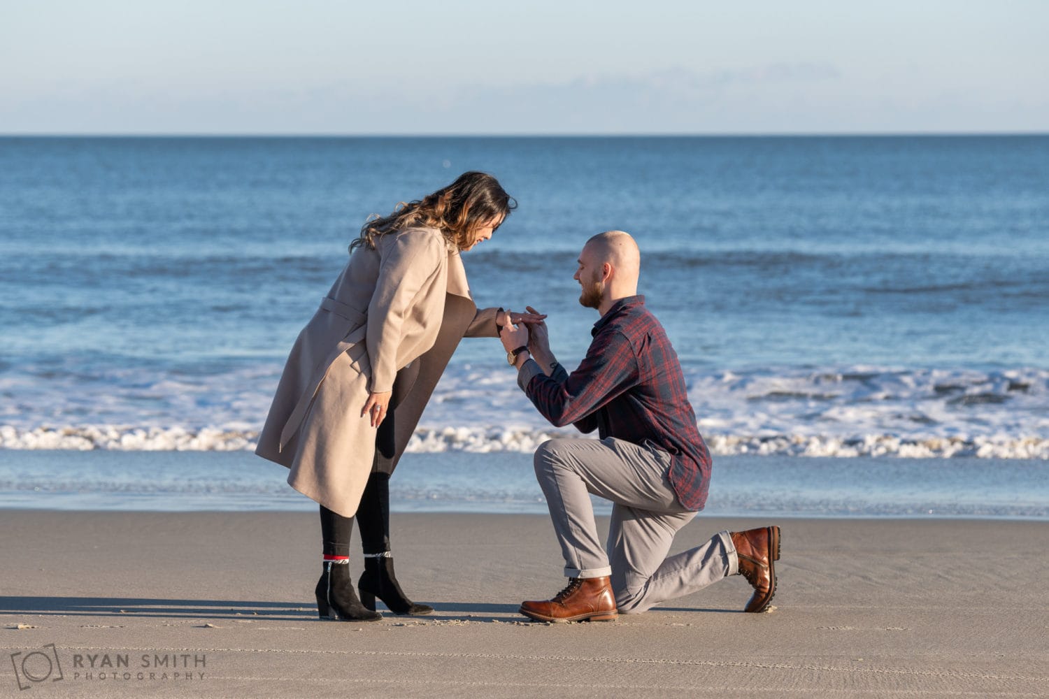Putting on the engagement ring - Huntington Beach State Park