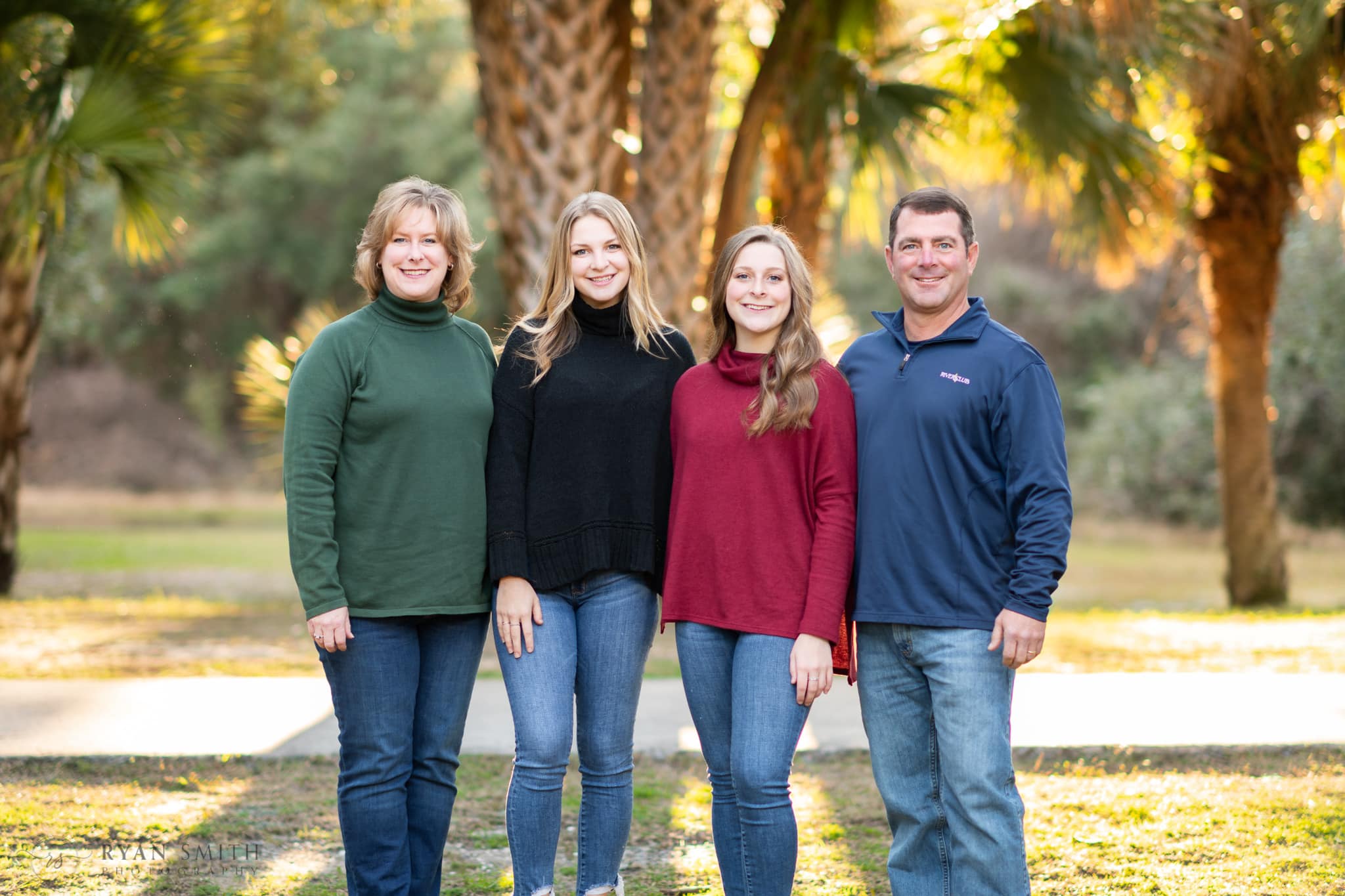 Family portrait in front of the palms - Huntington Beach State Park