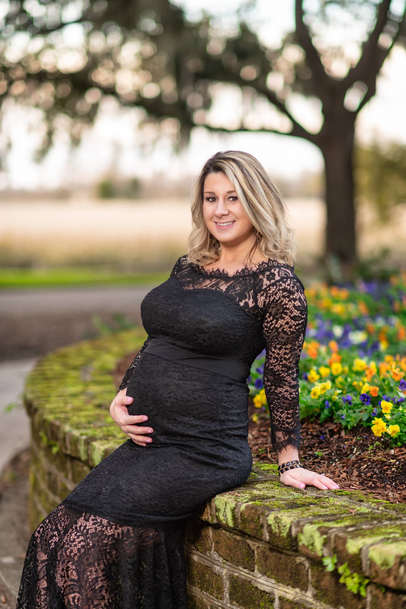 Maternity portrait sitting by the flowers - Caledonia Golf & Fish Club