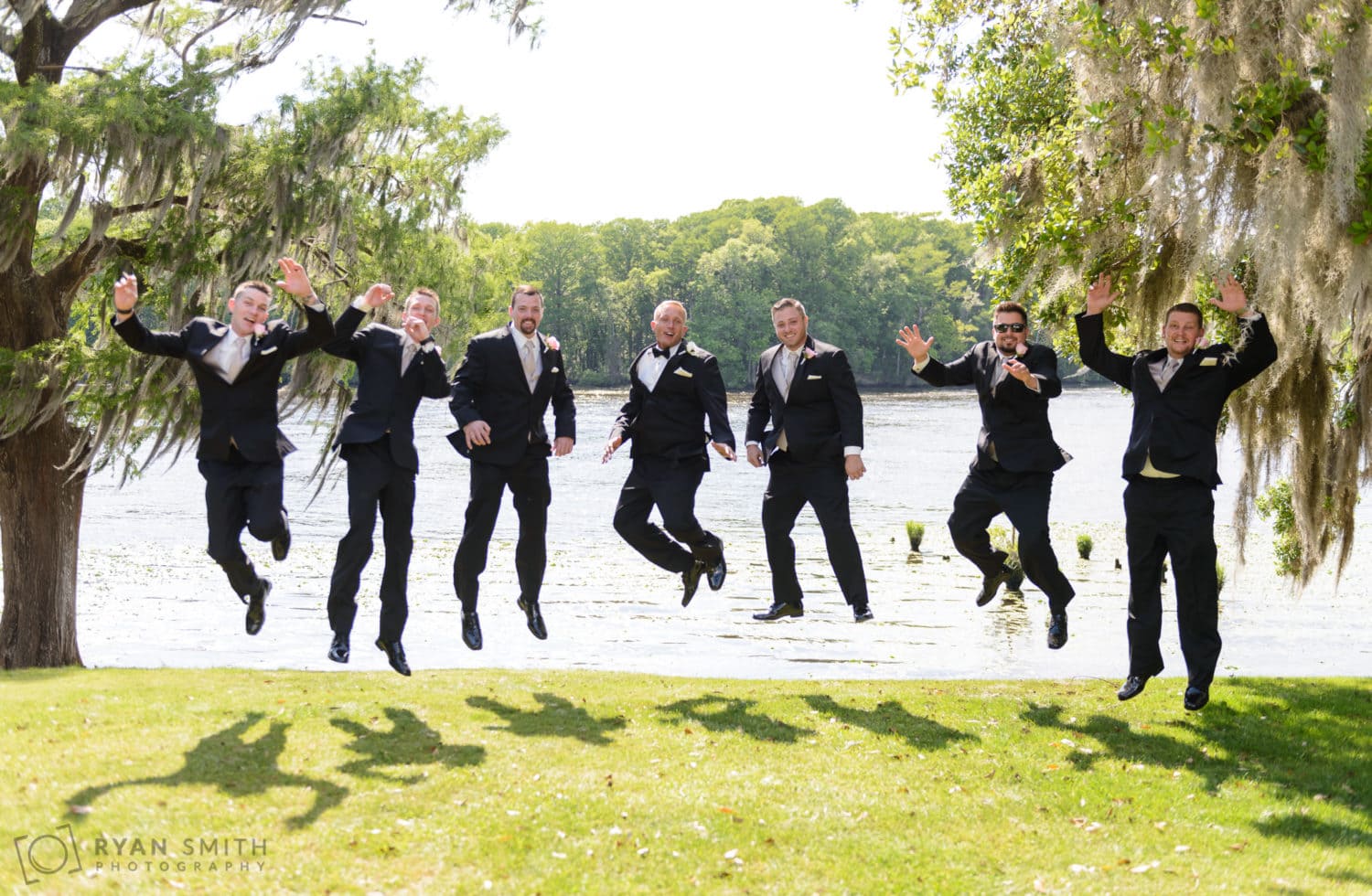 Pictures with groomsmen before the ceremony - Wachesaw Plantation