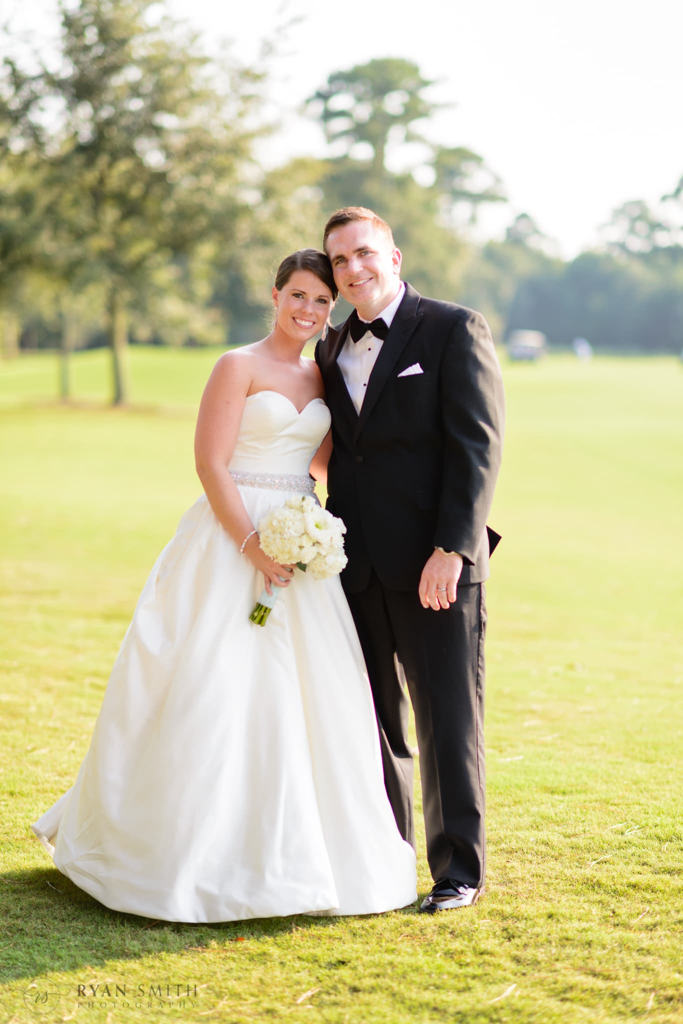 Bride and groom on the golf course - Daniel Island Club - Charleston, SC