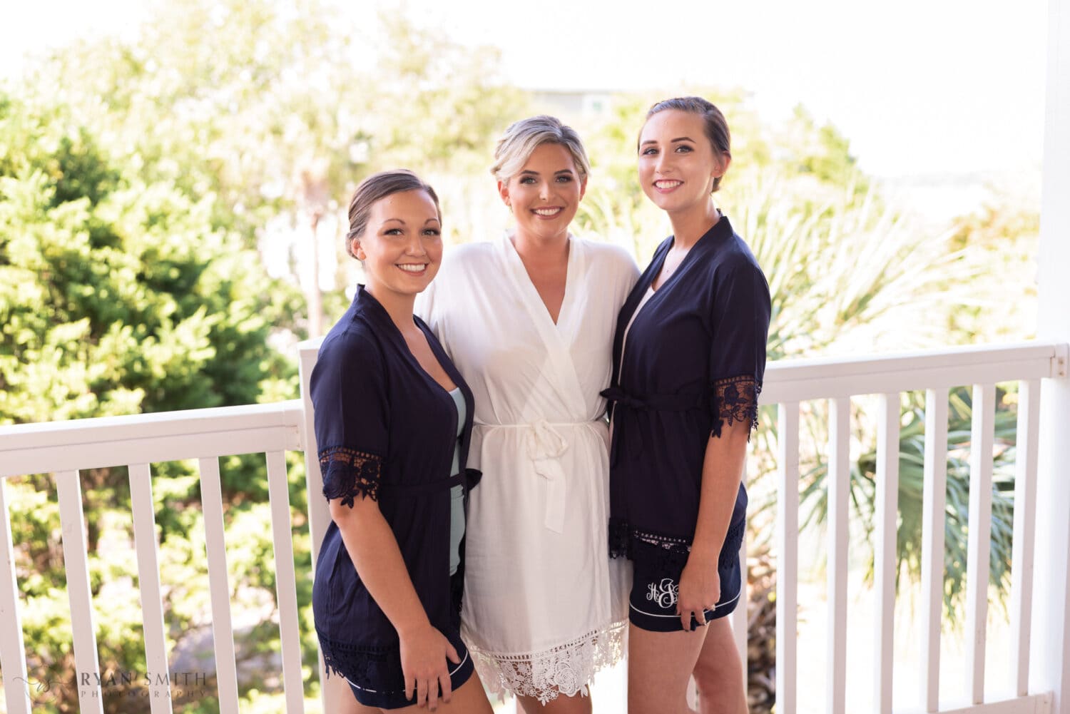 Bride with bridesmaids in robes - Folly Beach - Charleston