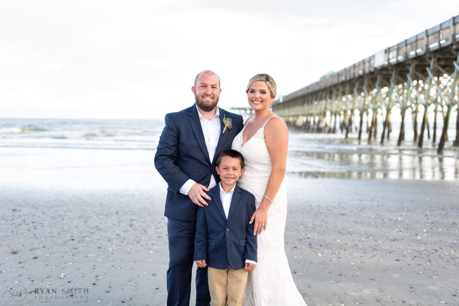 Family of three after the wedding - Folly Beach - Charleston