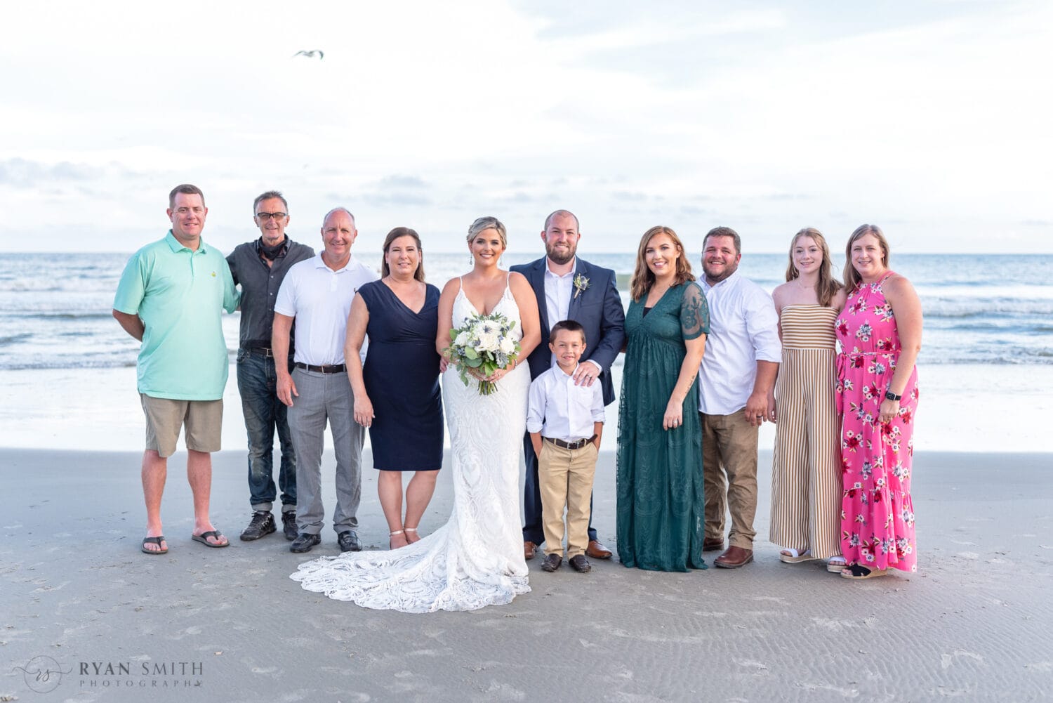Family portrait by the ocean - Folly Beach - Charleston