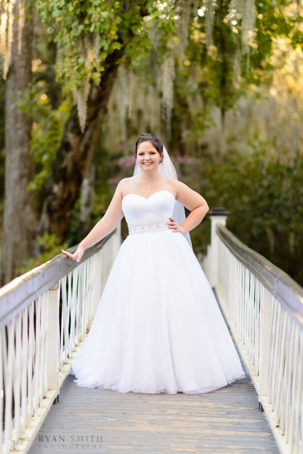 Portrait of bride on the white bridge - Magnolia Plantation
