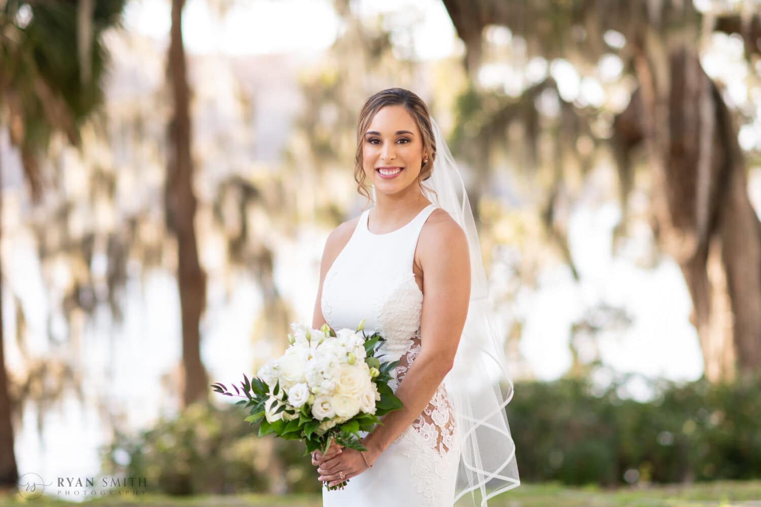 Beautiful portraits of the bride before the ceremony on the Wacammaw River - Kimbels at Wachesaw Plantation