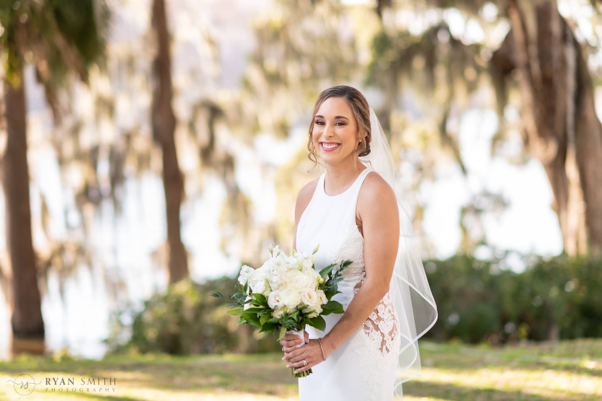 Beautiful portraits of the bride before the ceremony on the Wacammaw River - Kimbels at Wachesaw Plantation