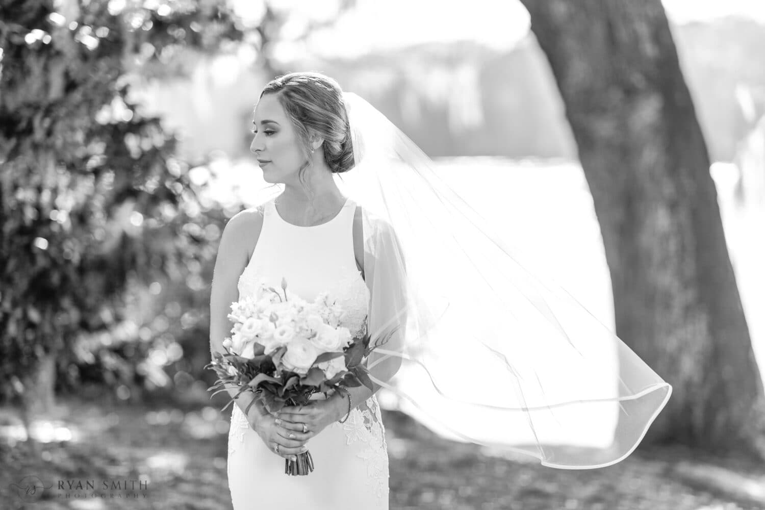 Portraits of the bride before the ceremony by the Wacammaw River - Kimbels at Wachesaw Plantation