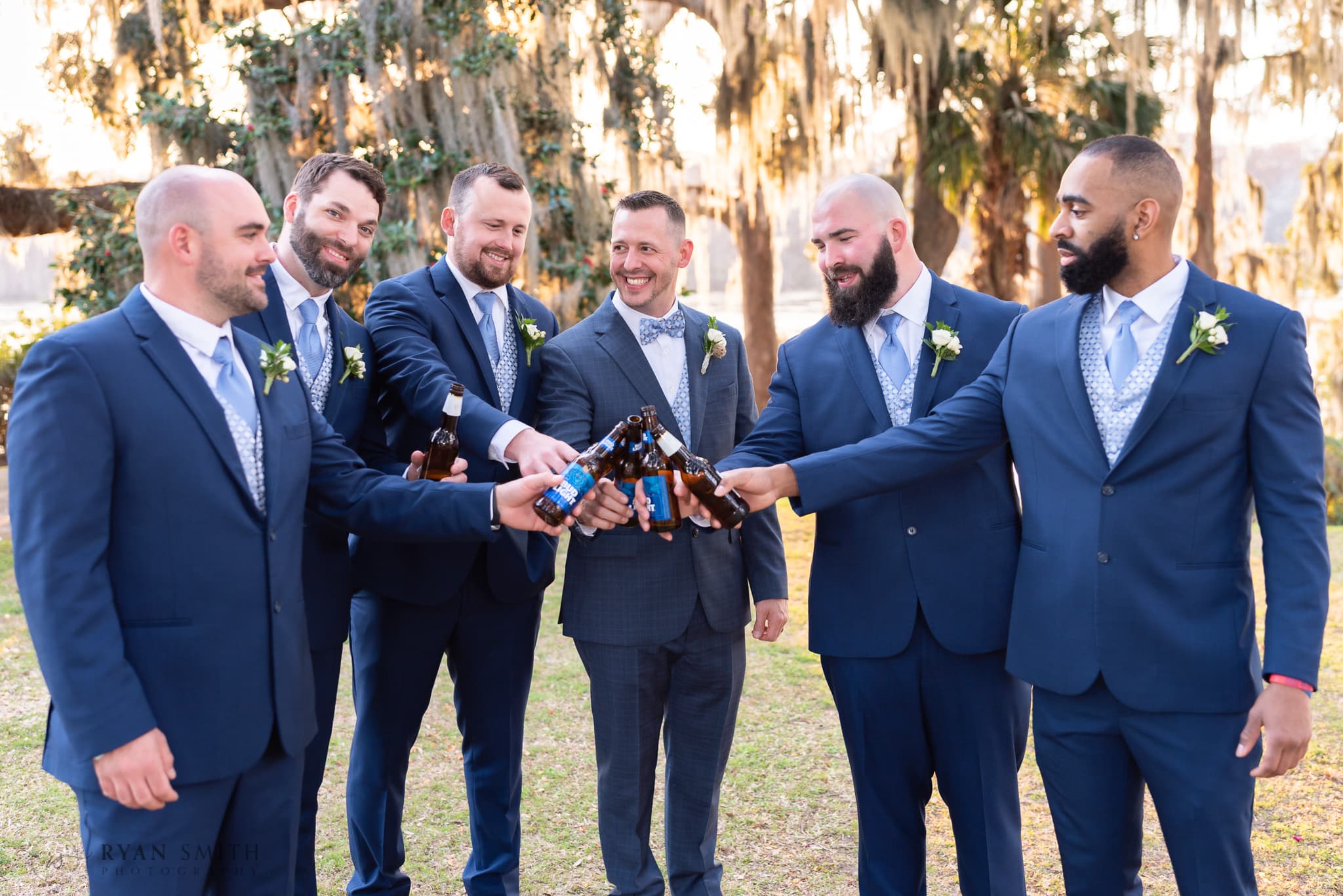 Toast with the groomsmen - Kimbels at Wachesaw Plantation