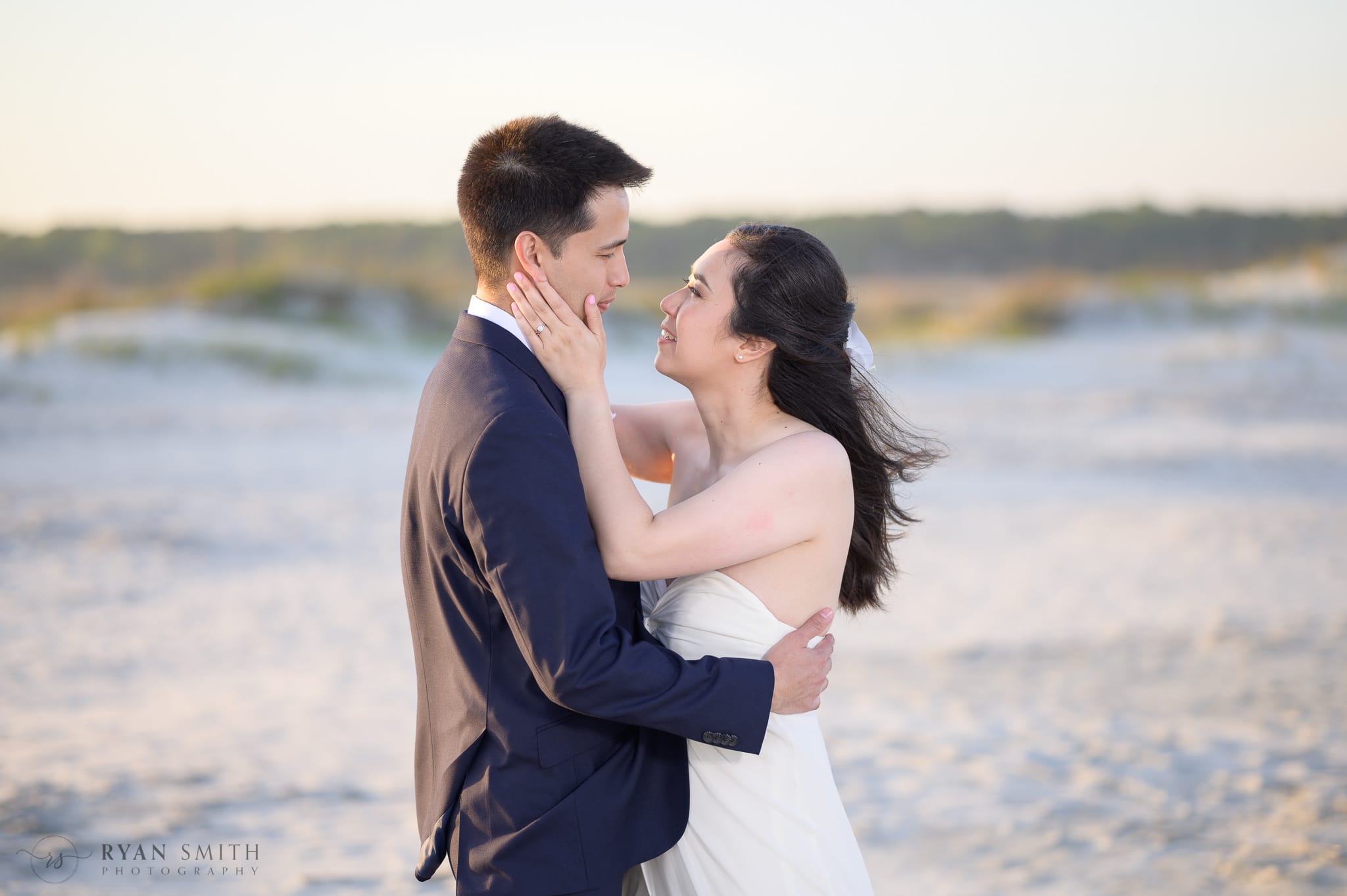 Bride touching groom's face - Cherry Grove Point - North Myrtle Beach