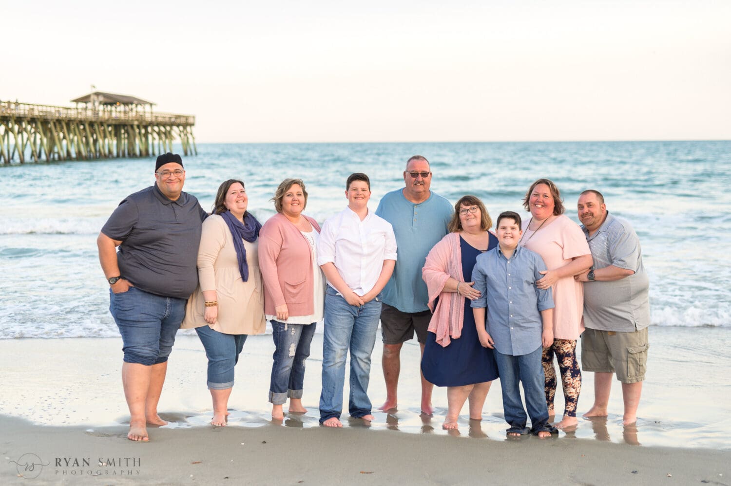 Family standing by the pier - Myrtle Beach State Park