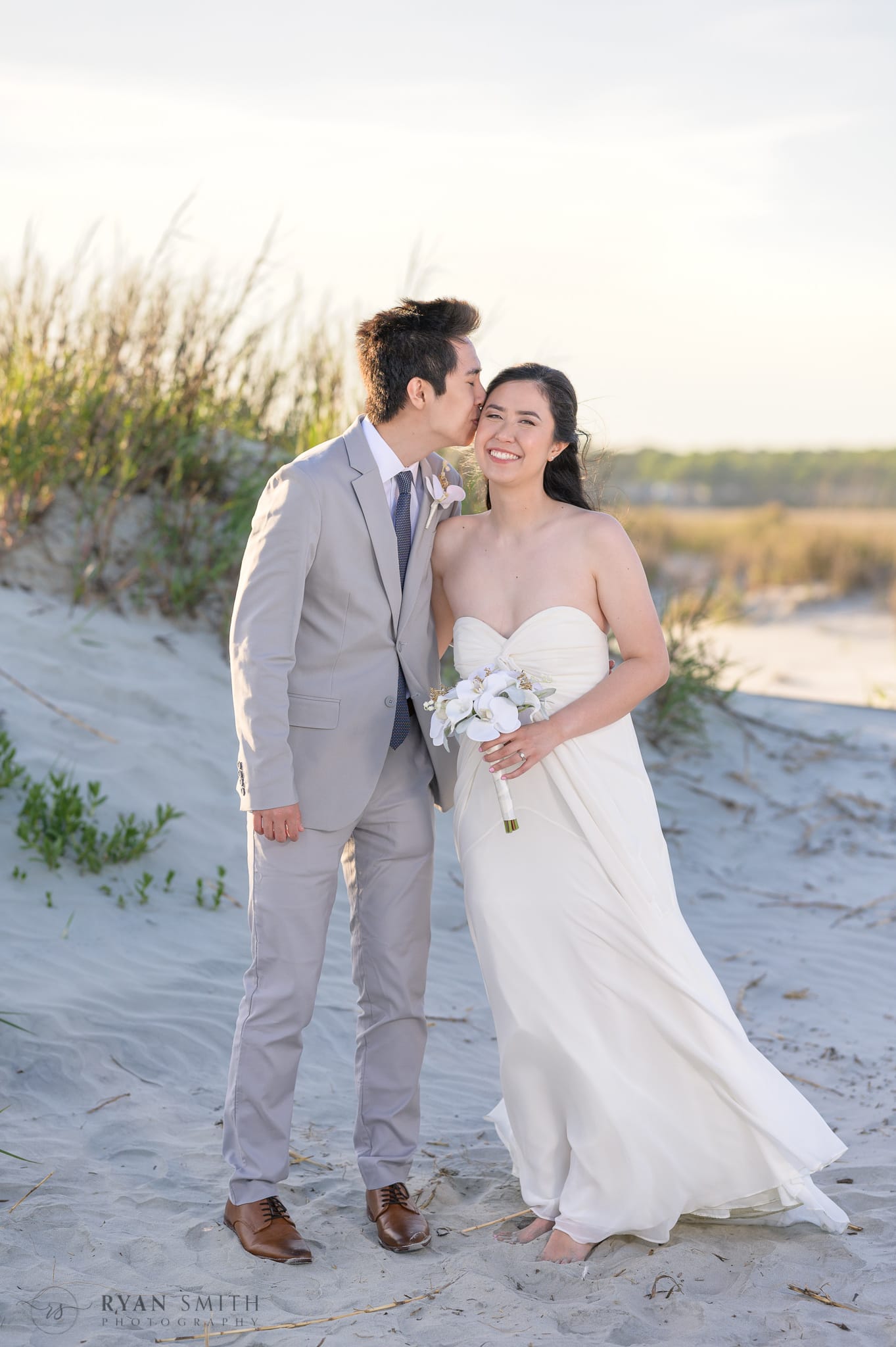 Kiss on the cheek from bride's brother - Cherry Grove Point - North Myrtle Beach