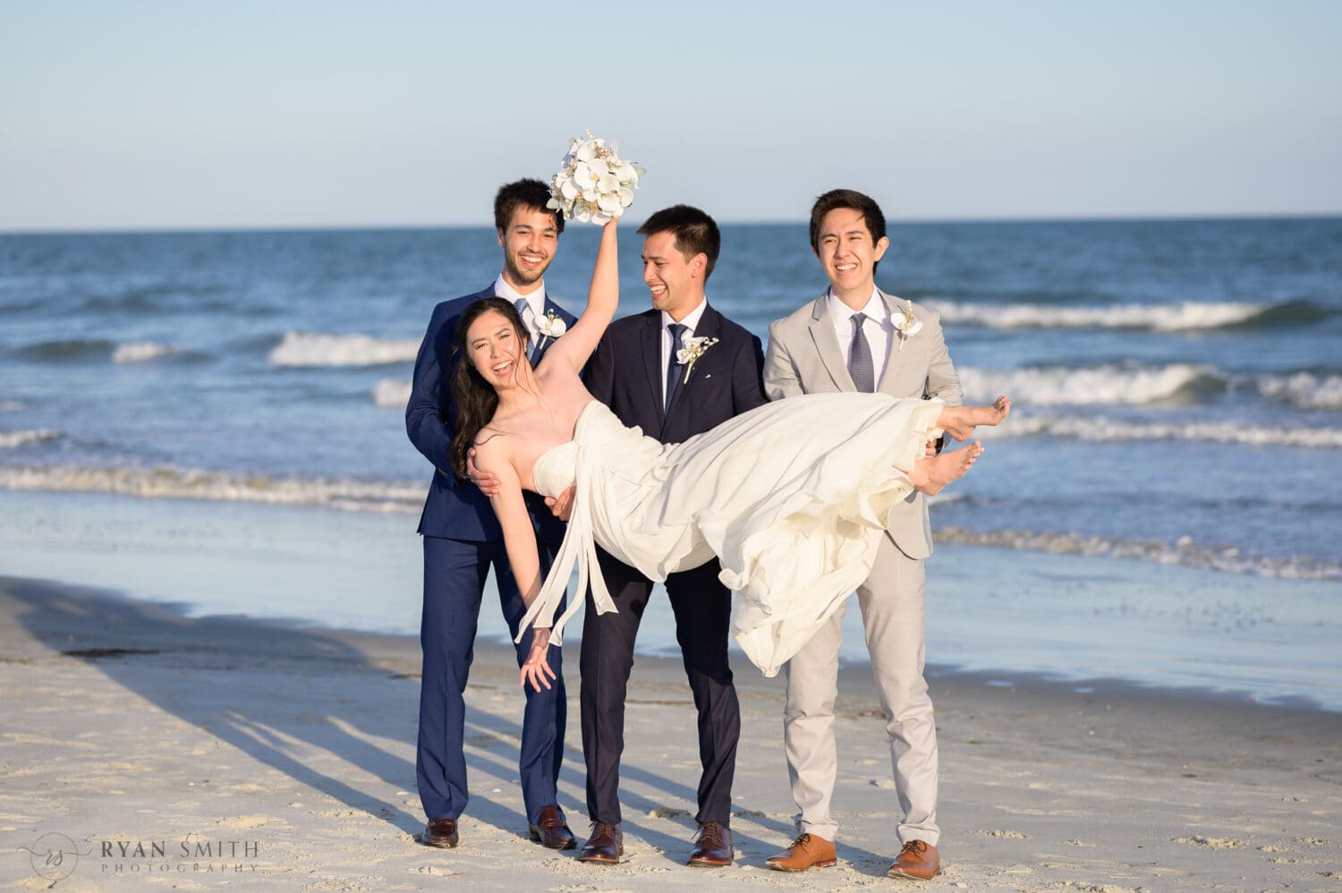 Lifting bride into the air - Cherry Grove Point - North Myrtle Beach