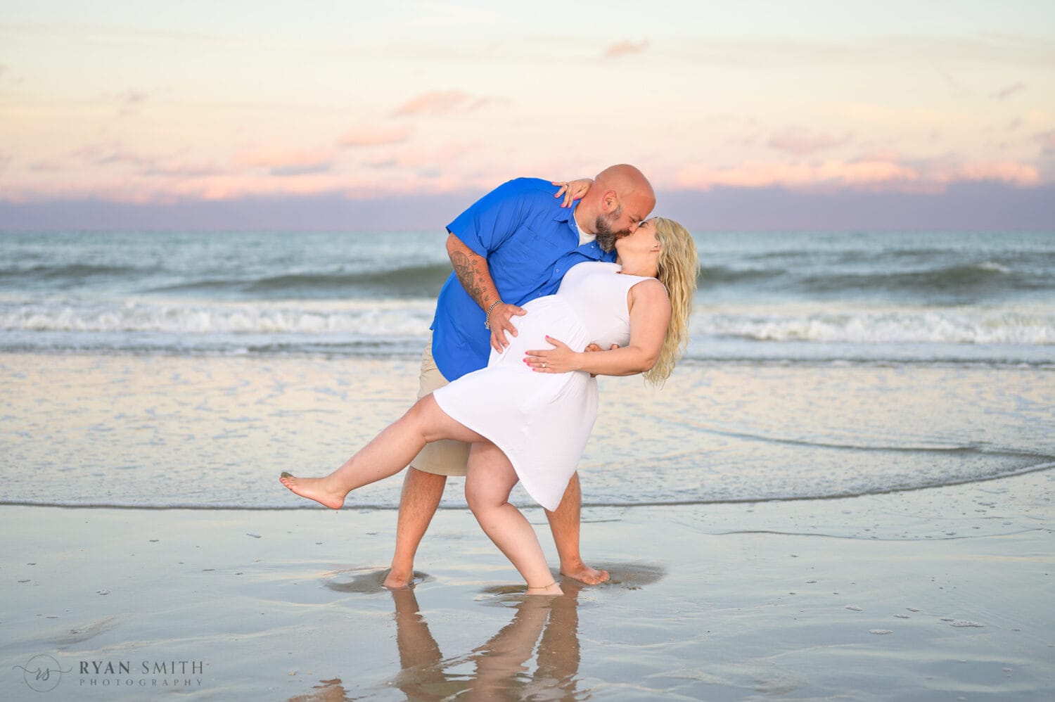 Dip back for a kiss with pregnant fiance  - Huntington Beach State Park