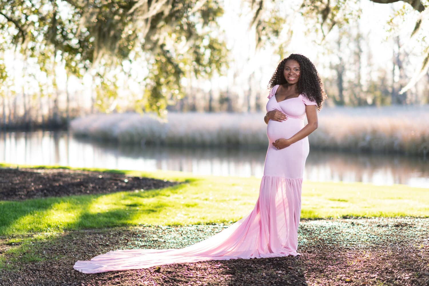 Maternity portraits of expecting mother by the marsh - Caledonia Golf & Fish Club