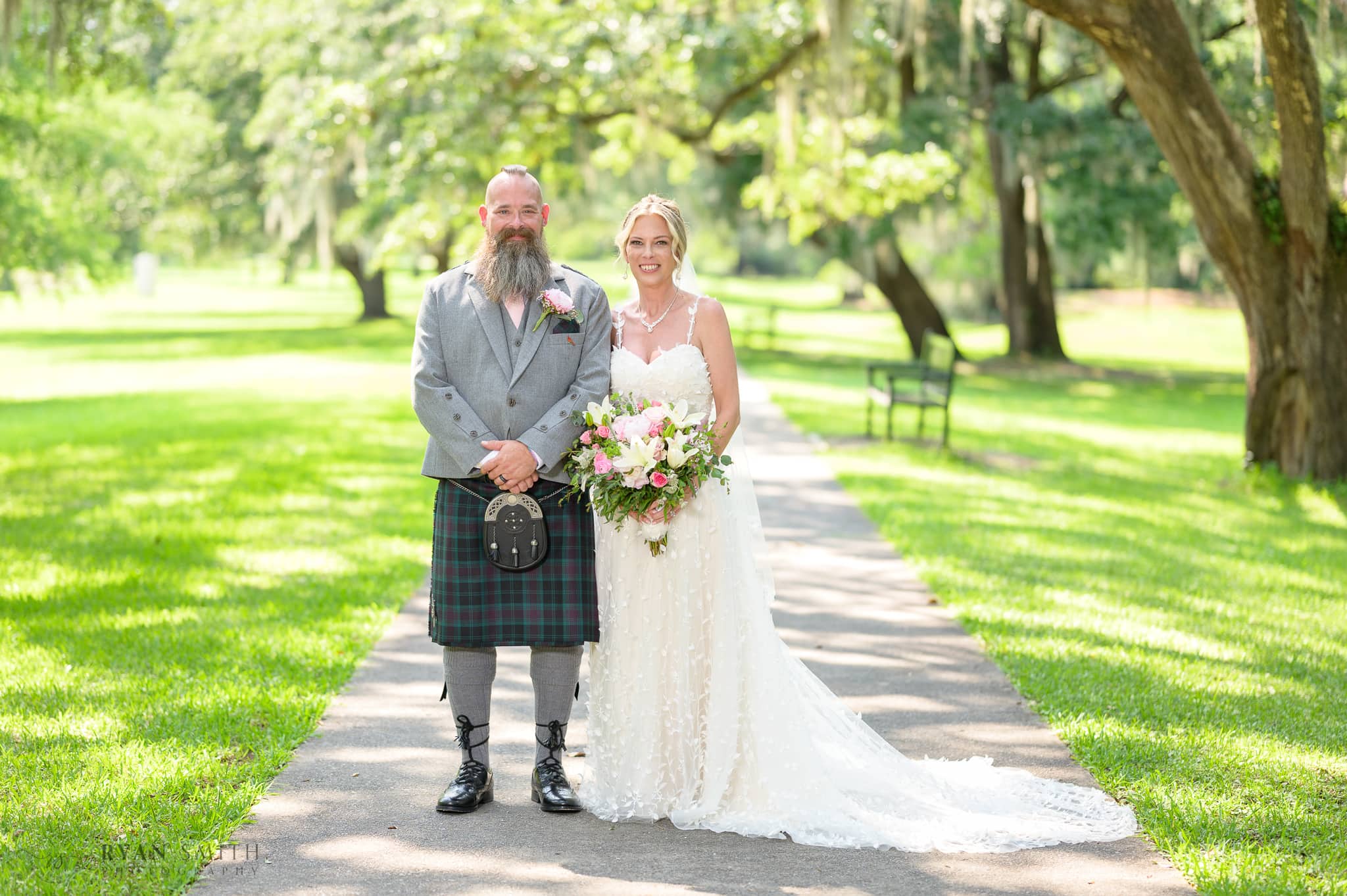 Bride with groom in Scottish kilt - Brookgreen Gardens