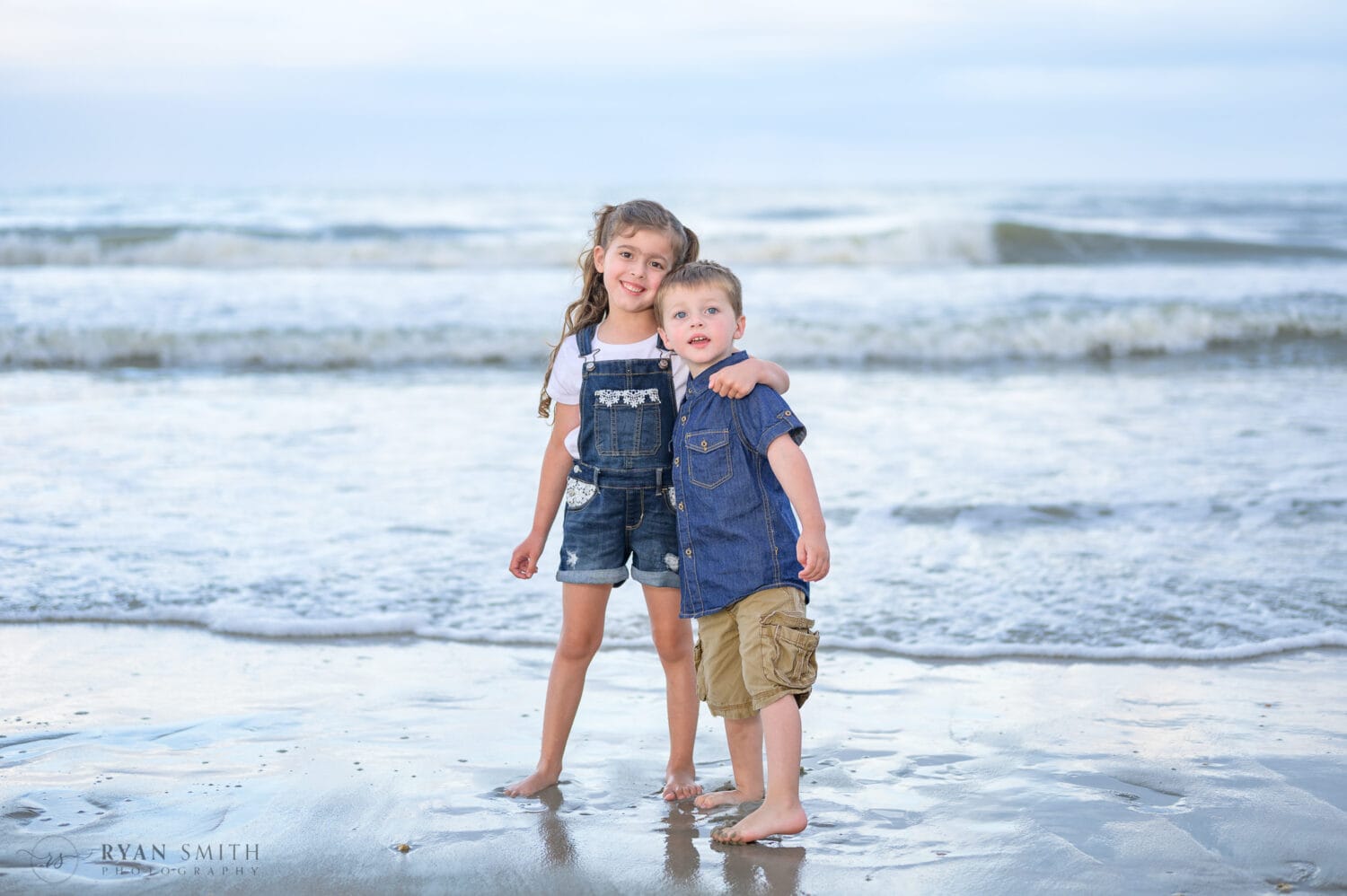 Brother and sisters by the ocean - Huntington Beach State Park