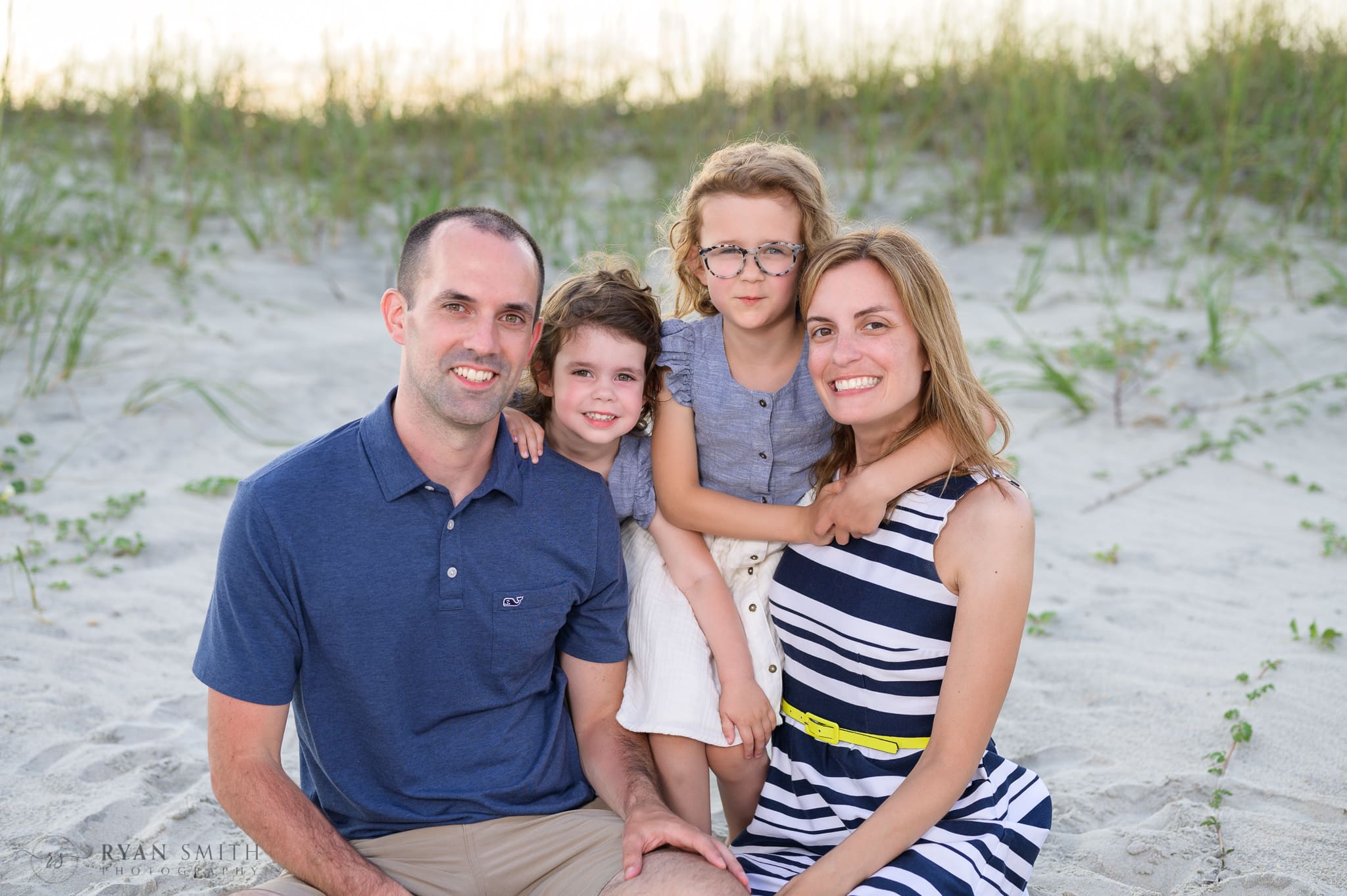 Family of 4 by the dunes - Huntington Beach State Park