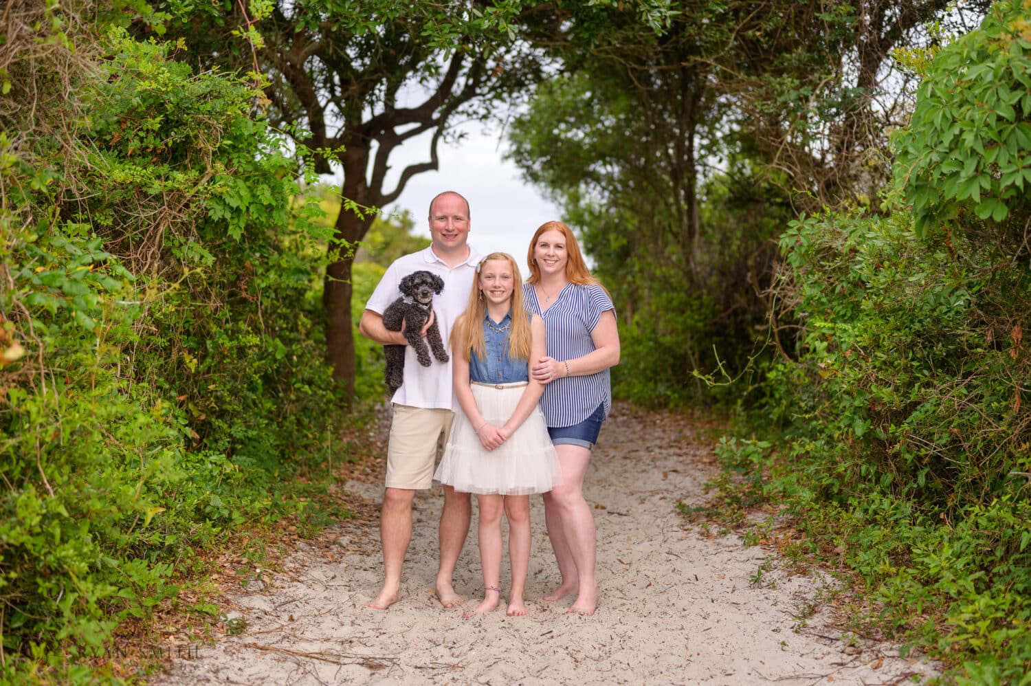 Family of three with their doggie  - Huntington Beach State Park