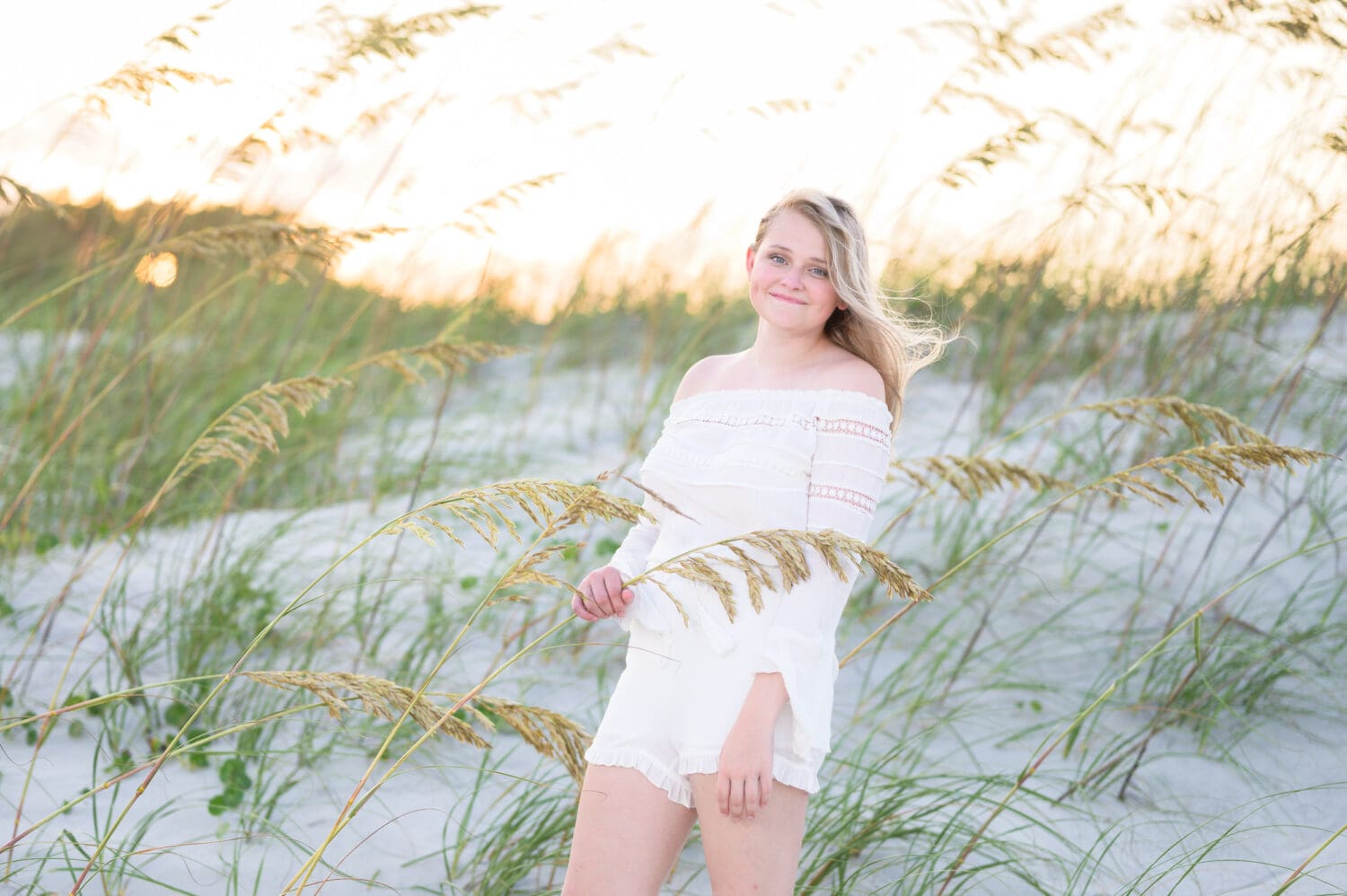 Senior girl standing in the seaoats  - Huntington Beach State Park