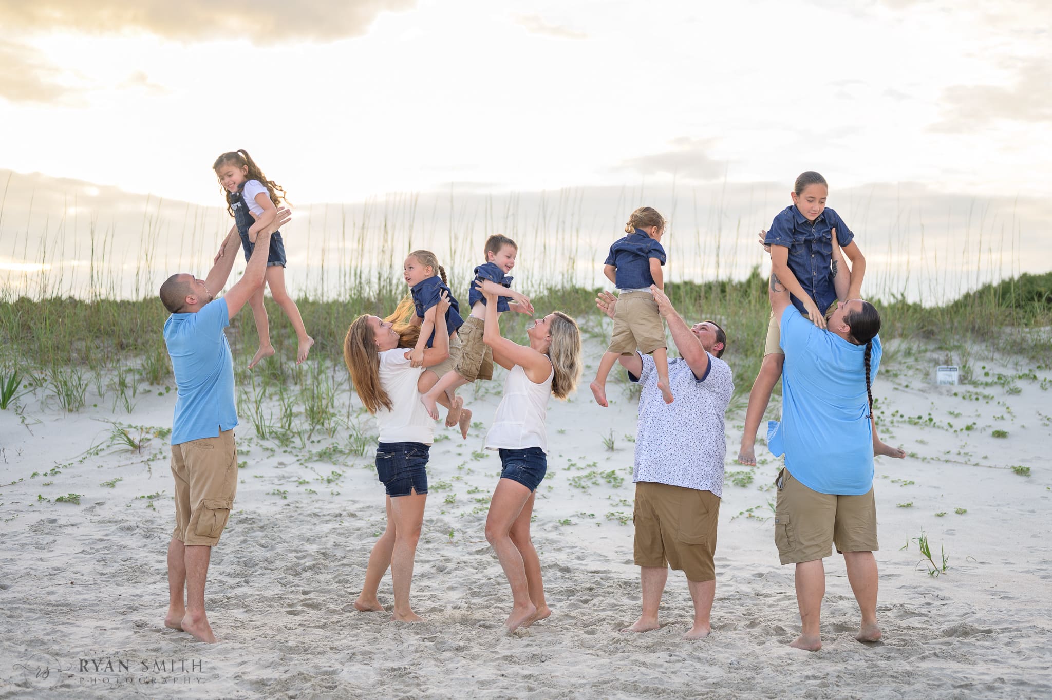 Throwing all the kids in the air at the same time - Huntington Beach State Park