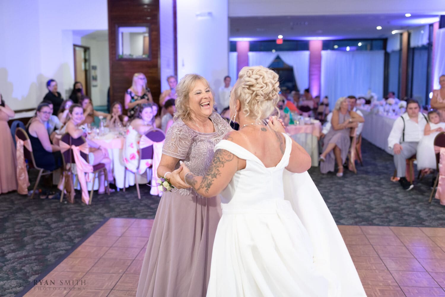 Bride and mother having fun dance together - Wild Wing Plantation