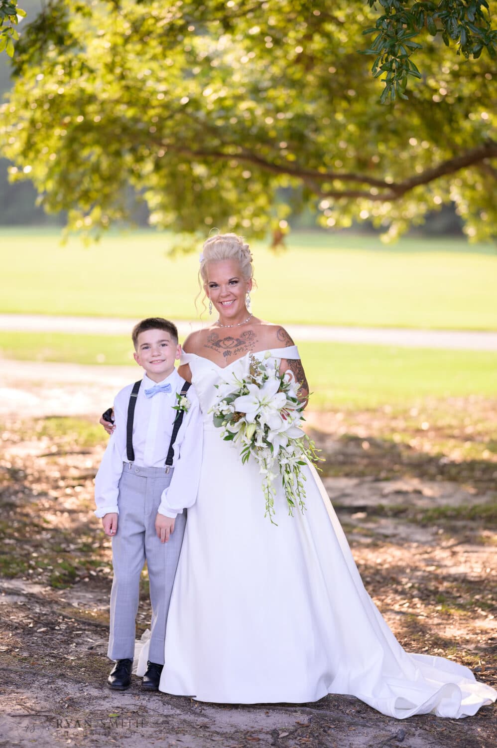 Bride with ring bearer son - Wild Wing Plantation