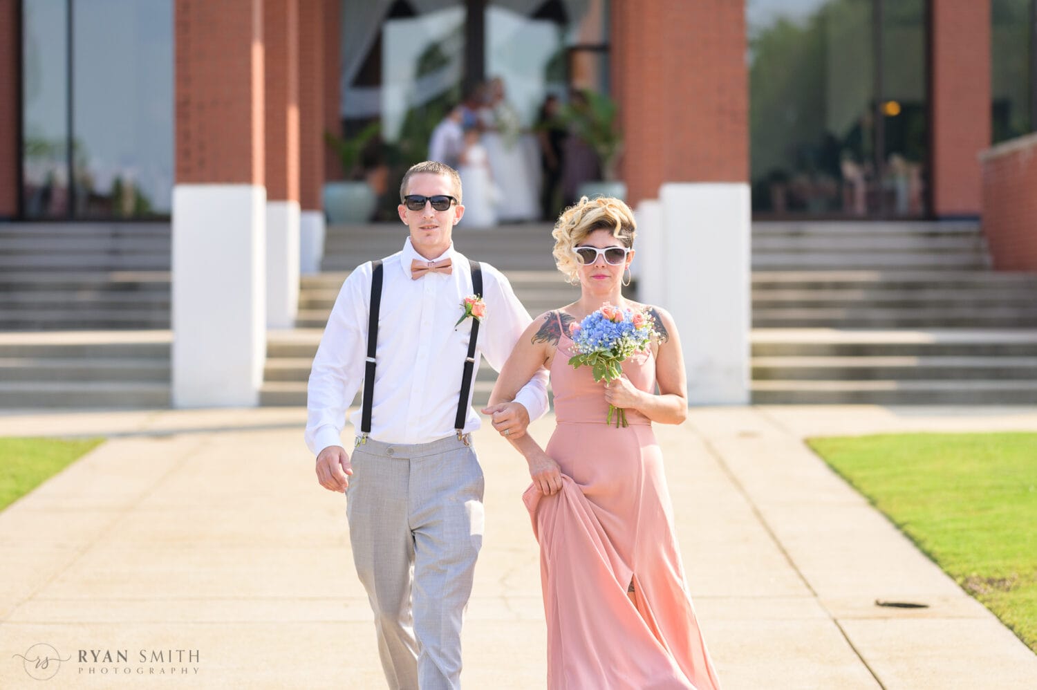 Bridesmaids and groomsmen walking to the ceremony - Wild Wing Plantation