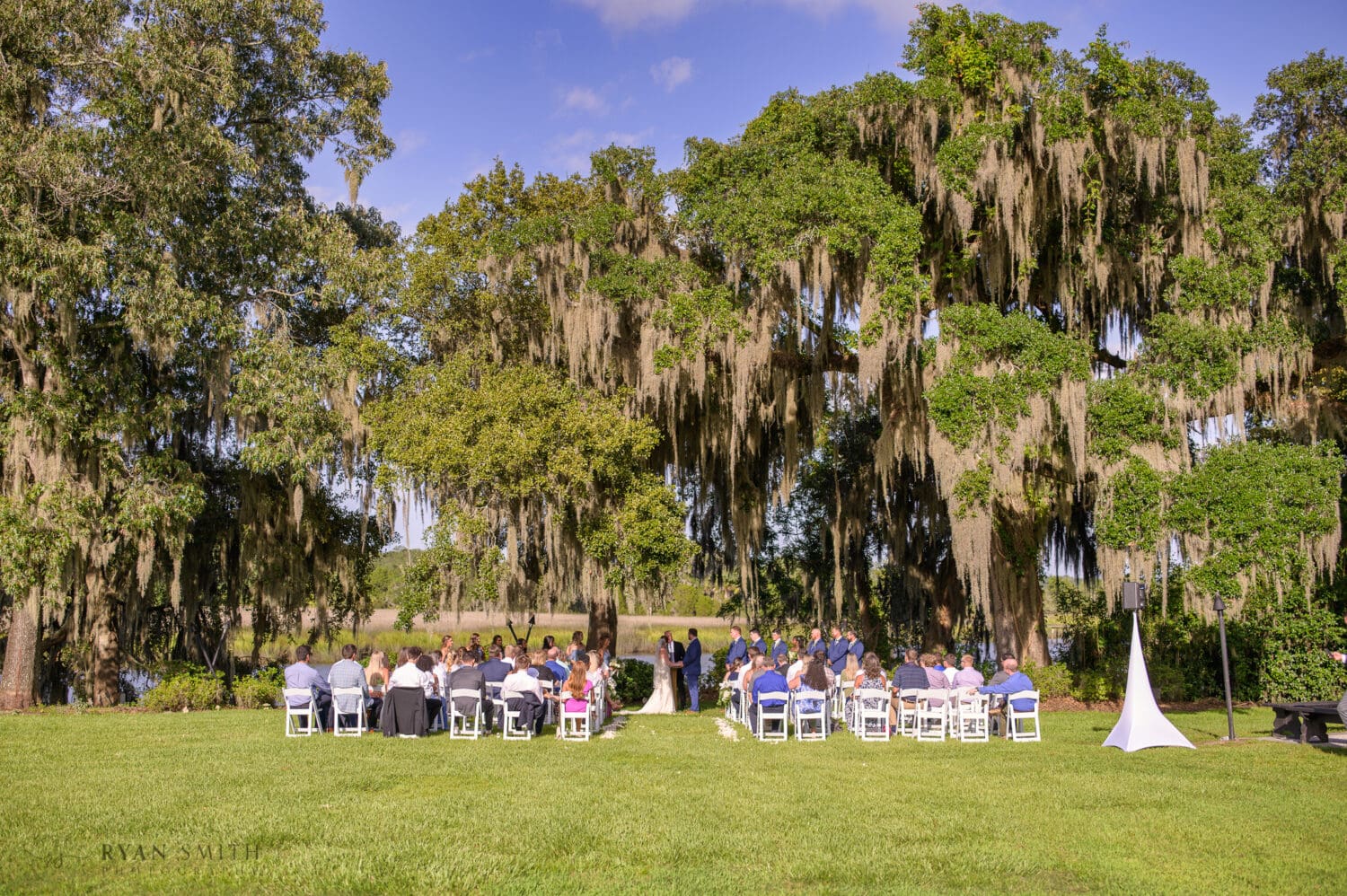 Ceremony under the oaks at the Carriage House - Magnolia Plantation