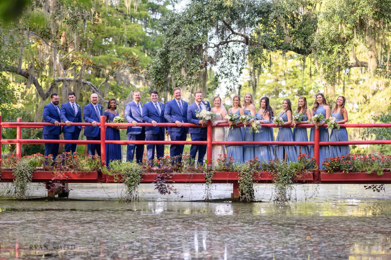 Wedding party on the red bridge  - Magnolia Plantation