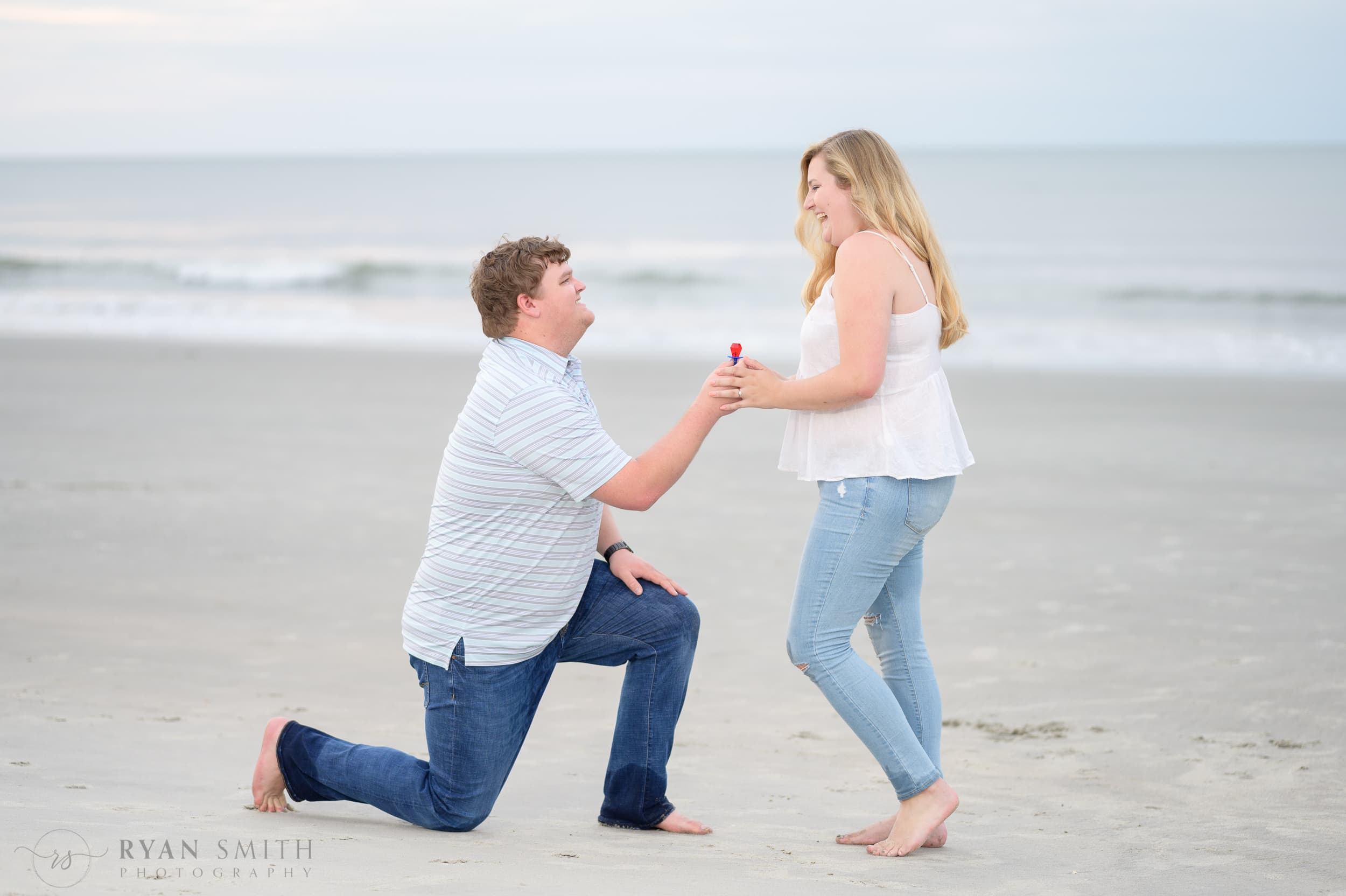Giving her a ring pop for engagement  - Huntington Beach State Park