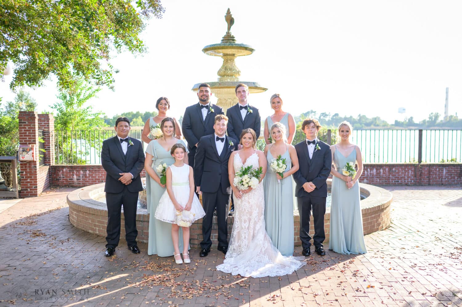 Bridal party standing by the fountain - Kaminski House Museum