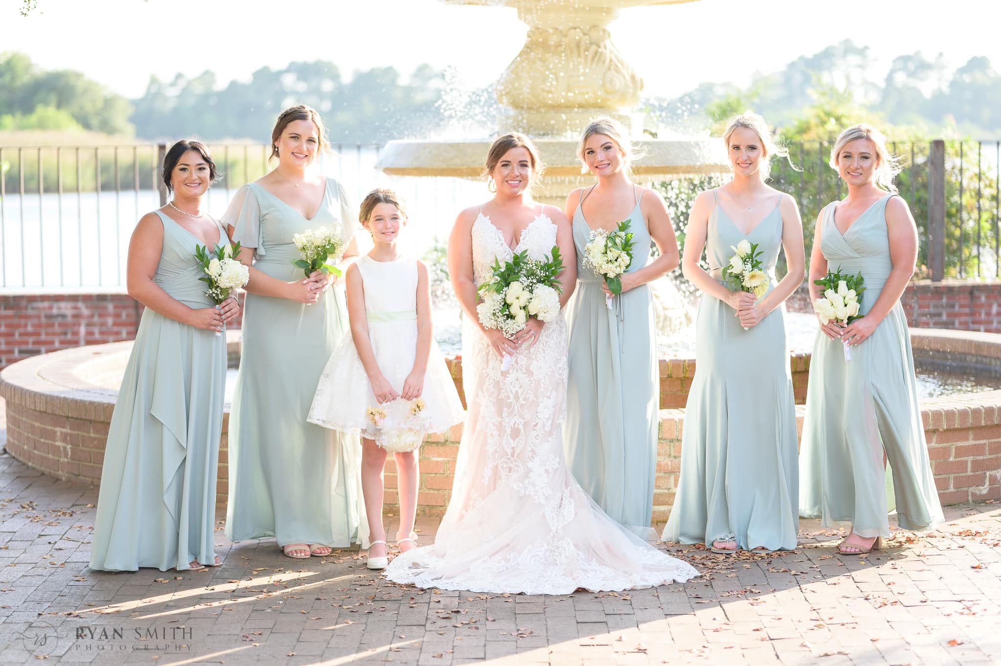 Bridesmaids in front of the fountain  - Kaminski House Museum
