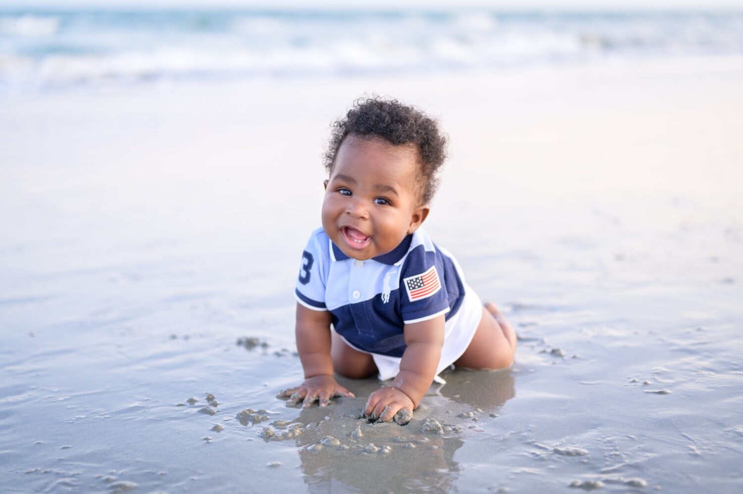 Happy baby by the ocean - Huntington Beach State Park