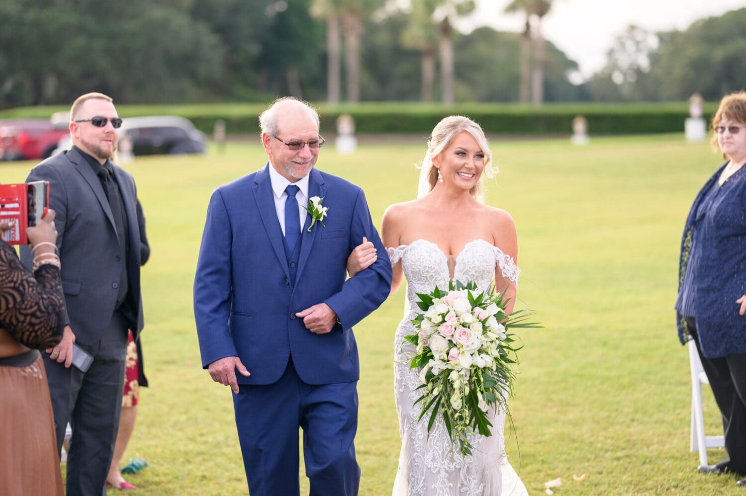 Bride and father walking to the ceremony - Dunes Golf and Beach Club