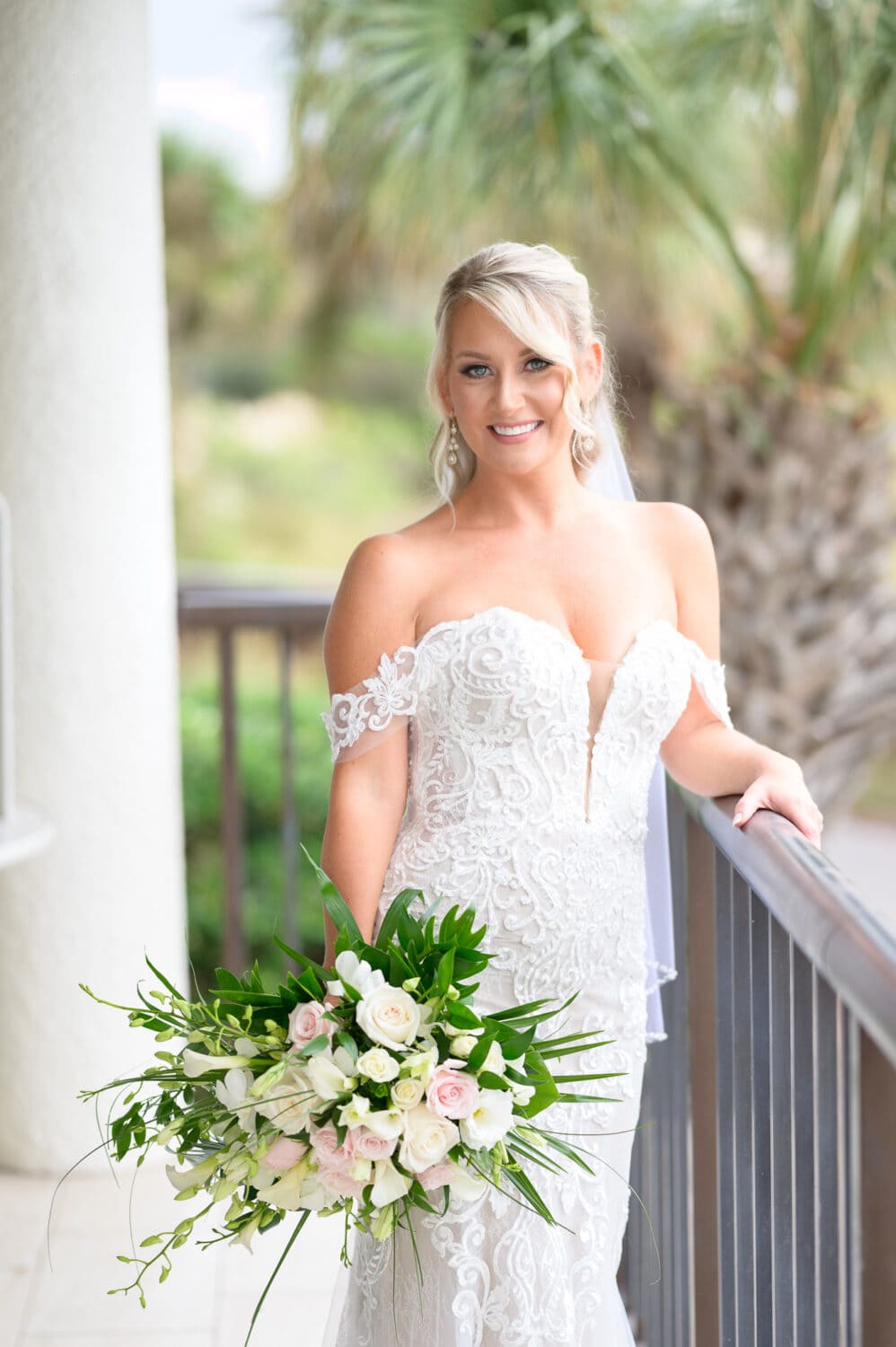 Bride before the ceremony on the balcony - Dunes Golf and Beach Club