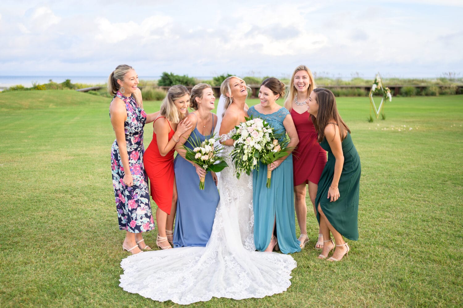 Bride laughing with friends after ceremony - Dunes Golf and Beach Club