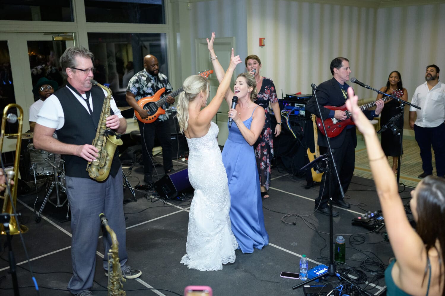 Bride singing on the stage - Dunes Golf and Beach Club