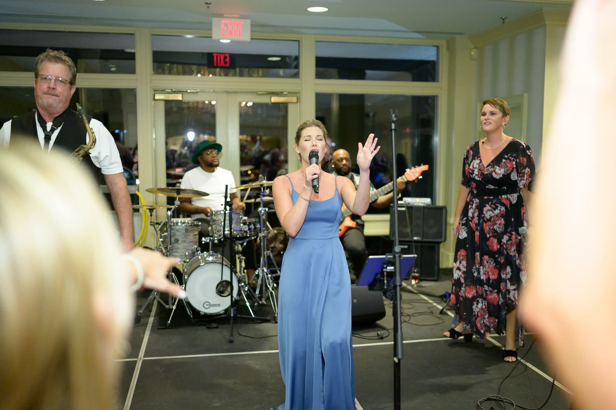 Bridesmaid singing during the reception - Dunes Golf and Beach Club