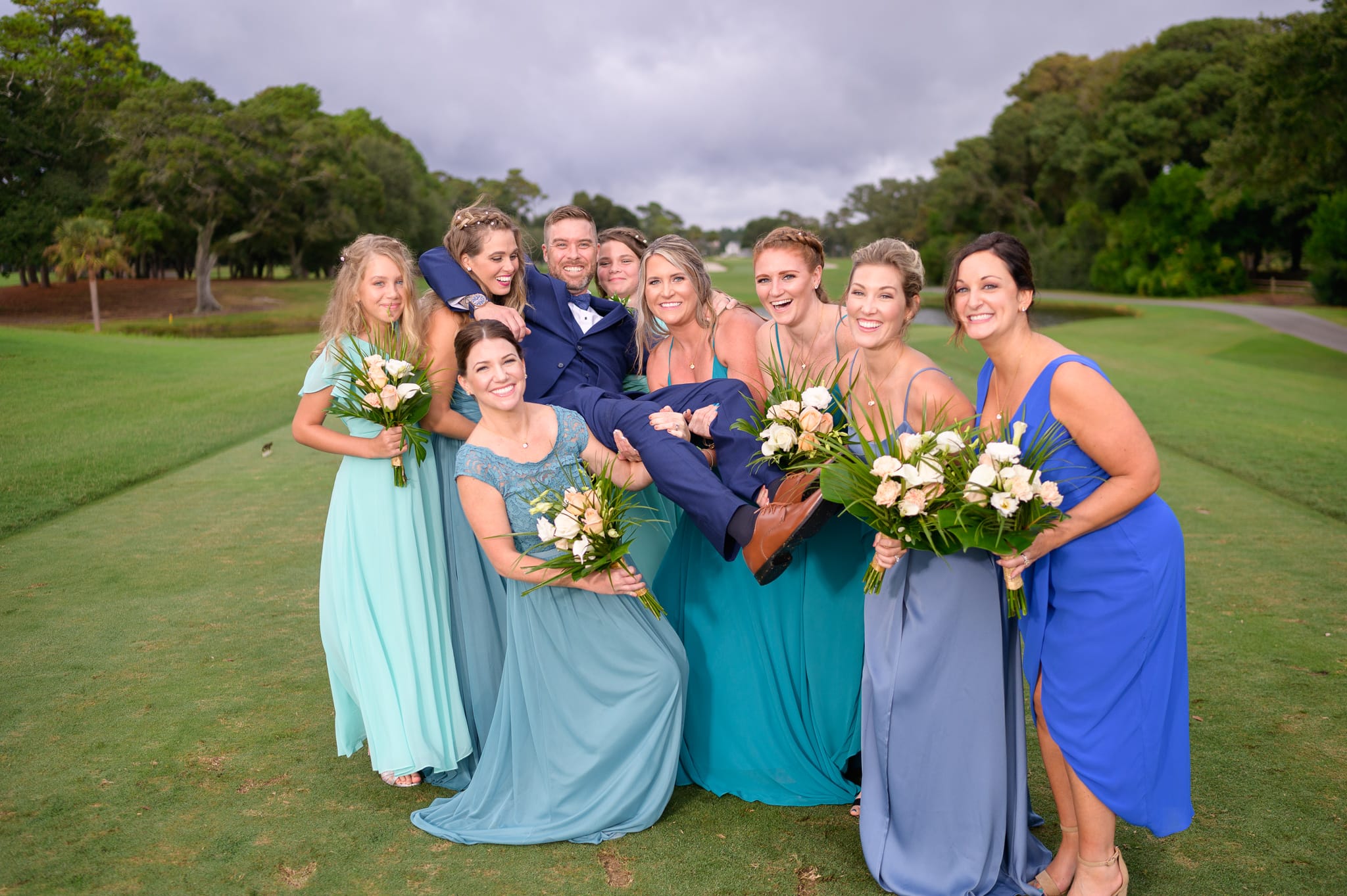 Bridesmaids picking up the groom - Dunes Golf and Beach Club