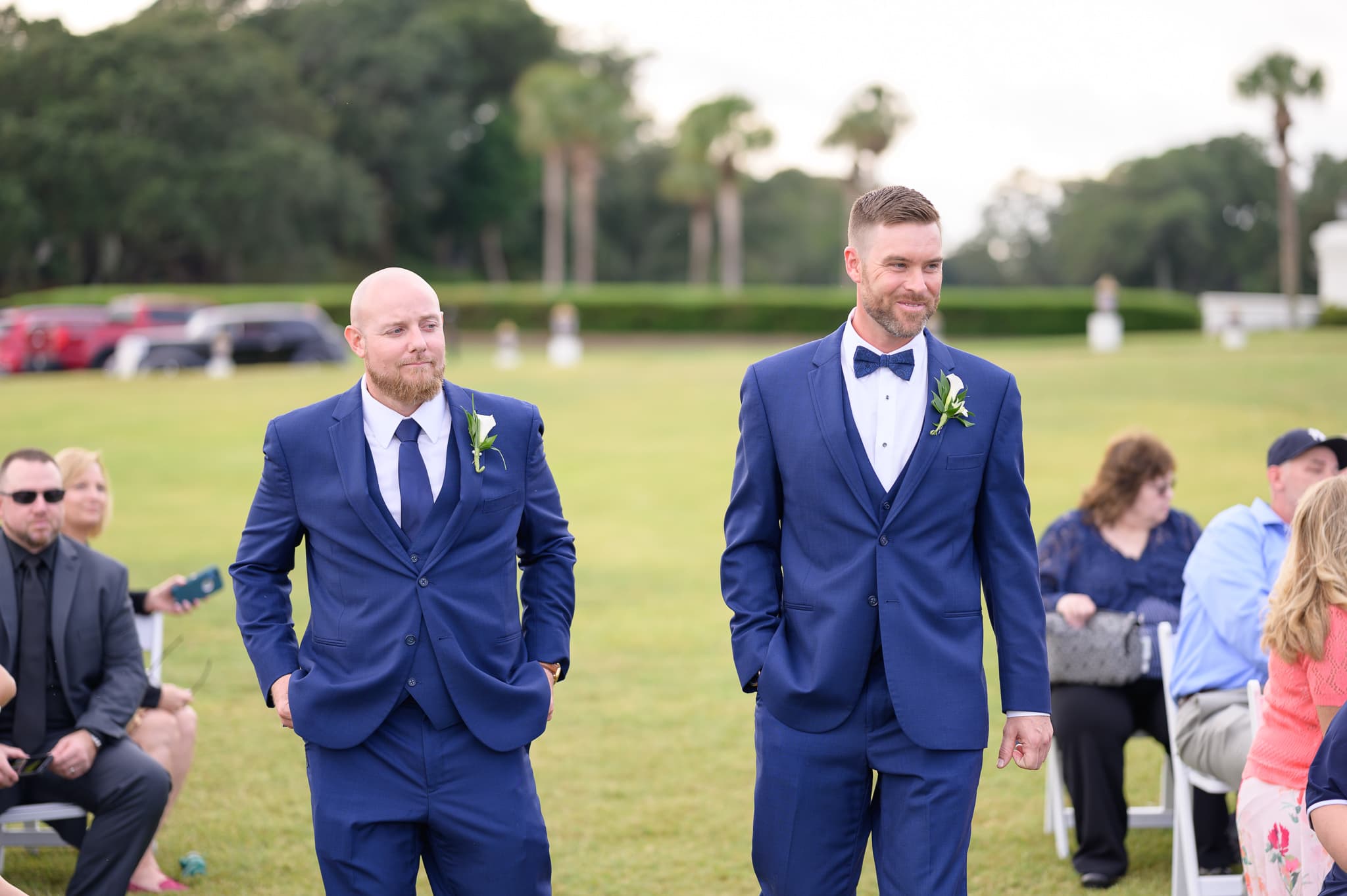 Groom and best man walking to ceremony - Dunes Golf and Beach Club