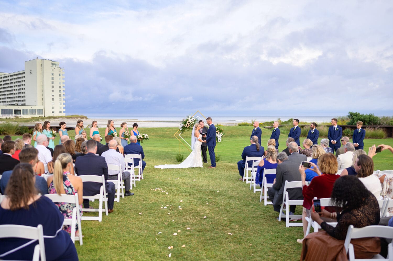Wide angle of ceremony on the lawn - Dunes Golf and Beach Club
