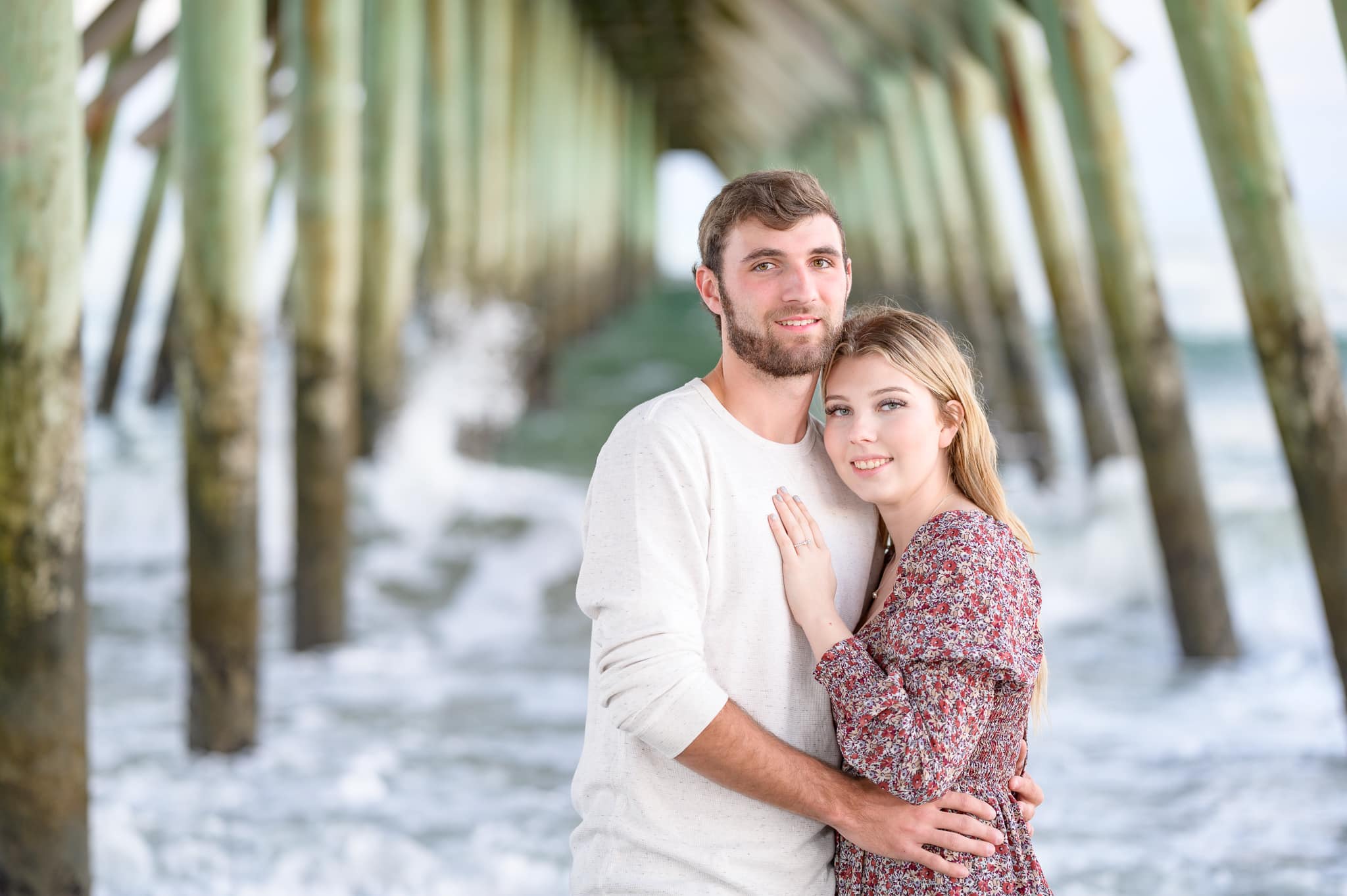 Engagement portrait under the pier  - Myrtle Beach State Park