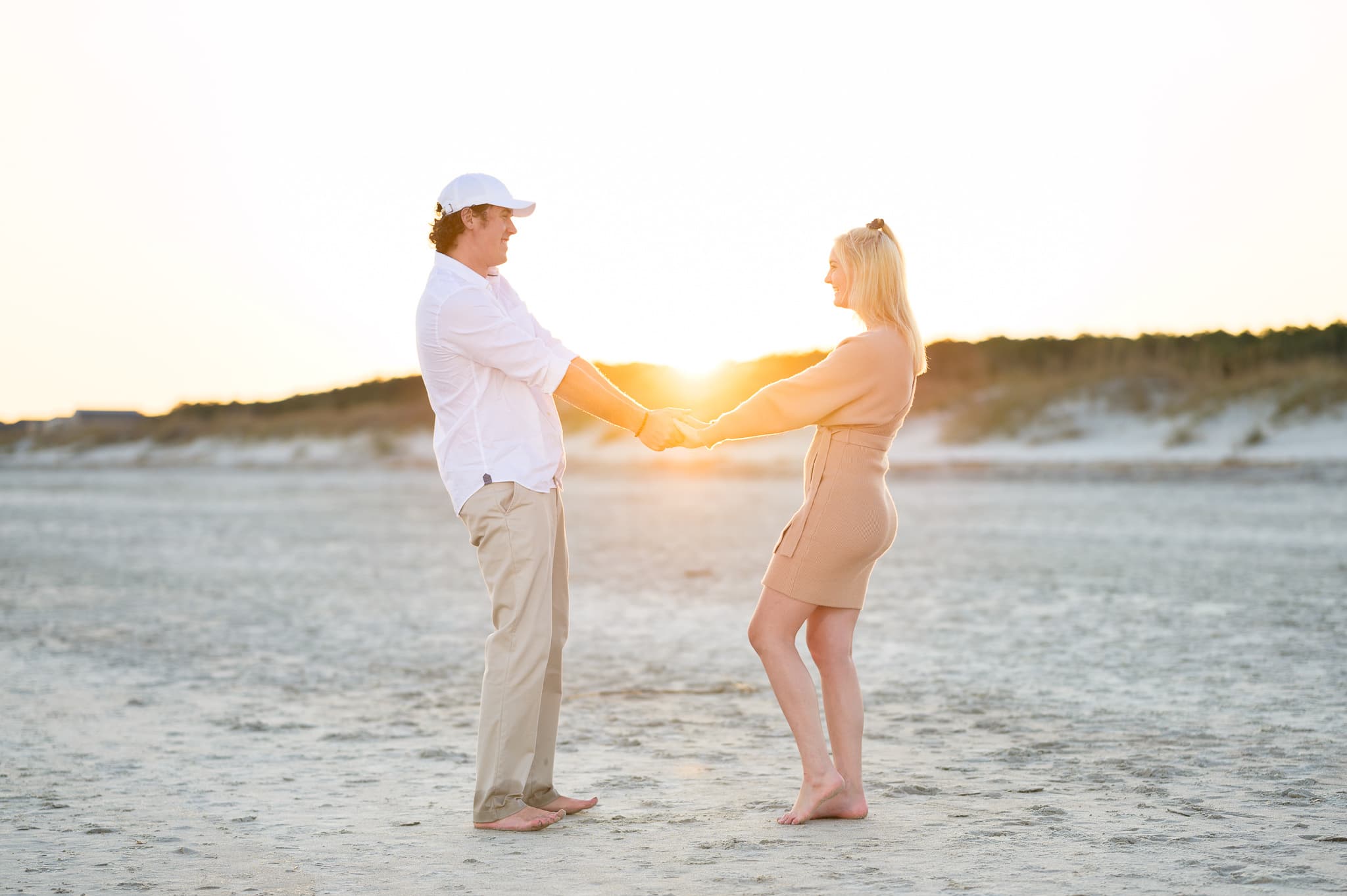 Holding hands in the sunset - Huntington Beach State Park
