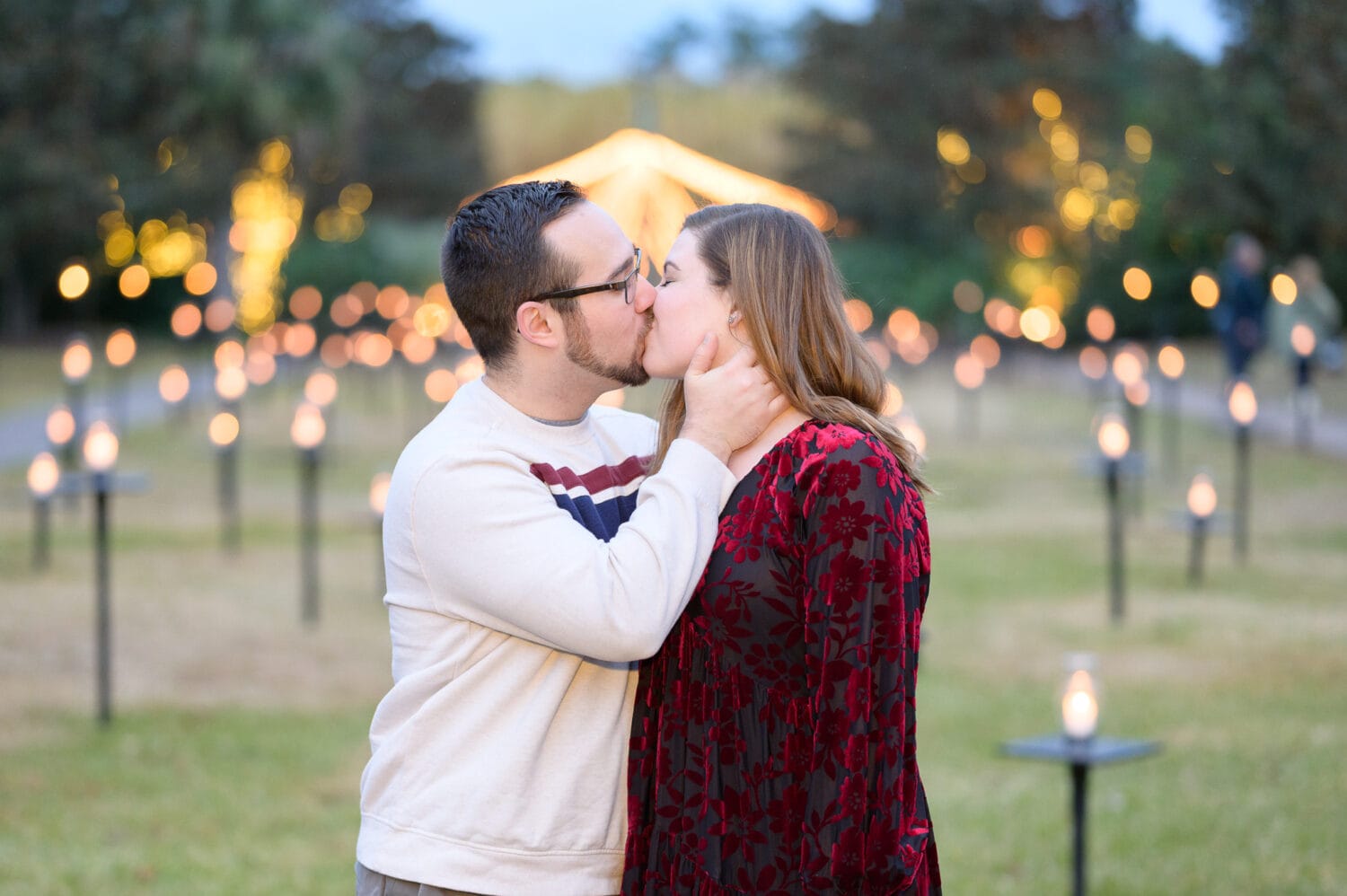 Kiss with lots of candles in the background - Brookgreen Gardens