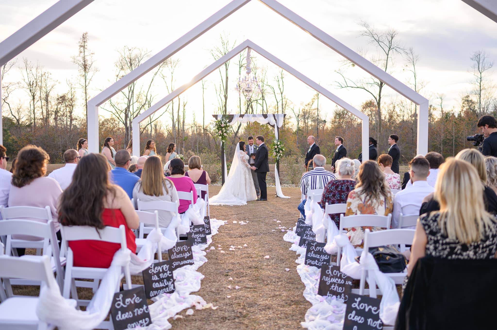 Wedding ceremony in the sunset - The Venue at White Oaks Farm