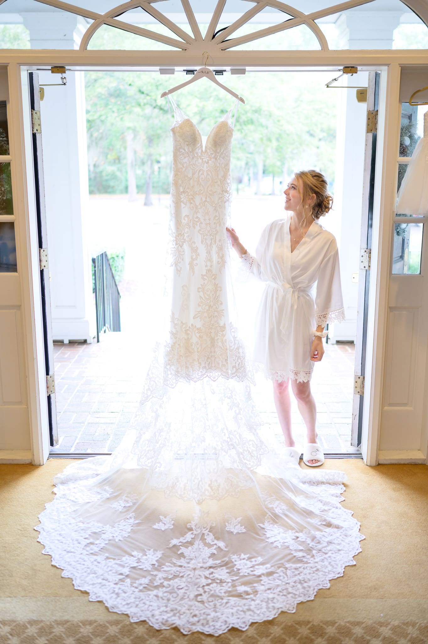 Bride looking at her dress - Pawleys Plantation Golf & Country Club