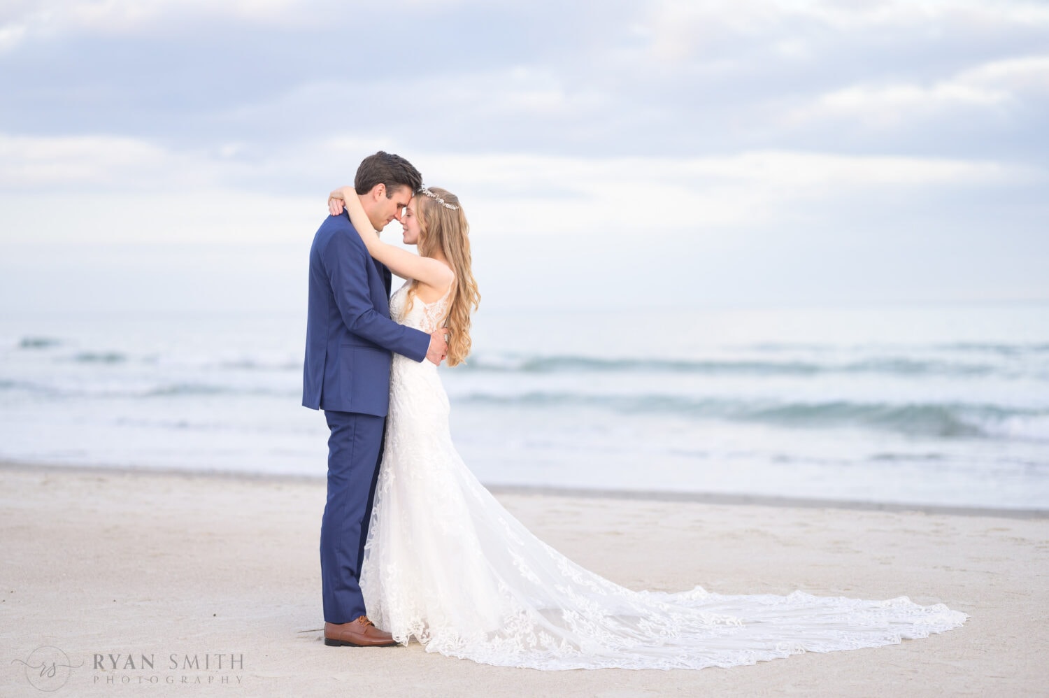 Touching foreheads in front of the ocean - Pawleys Island