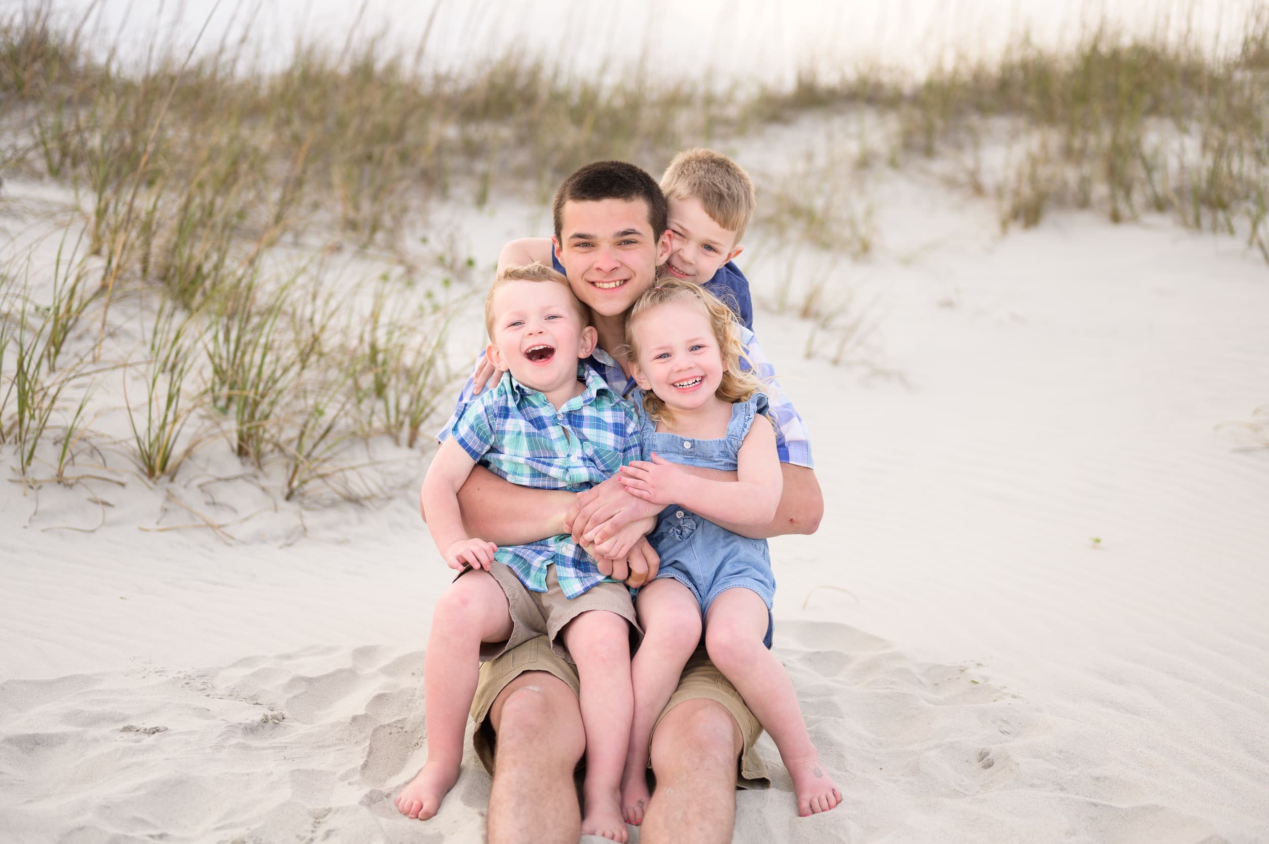 Big brother getting a hug from the kids - Pawleys Island