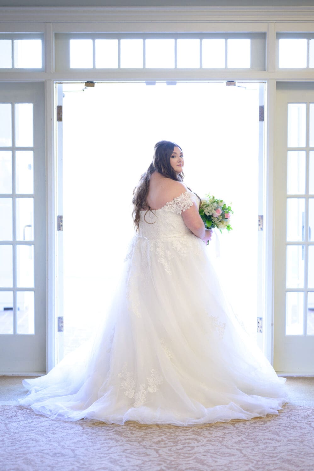 Bride in the light of the doorway - Pawleys Plantation Golf & Country Club